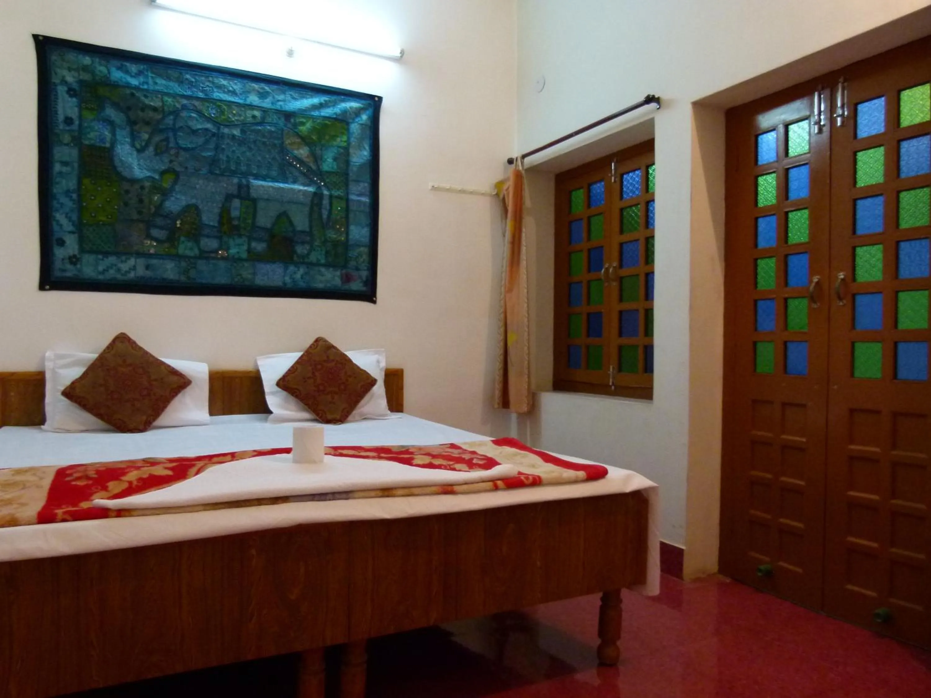 Bed in Gajanand Guest House