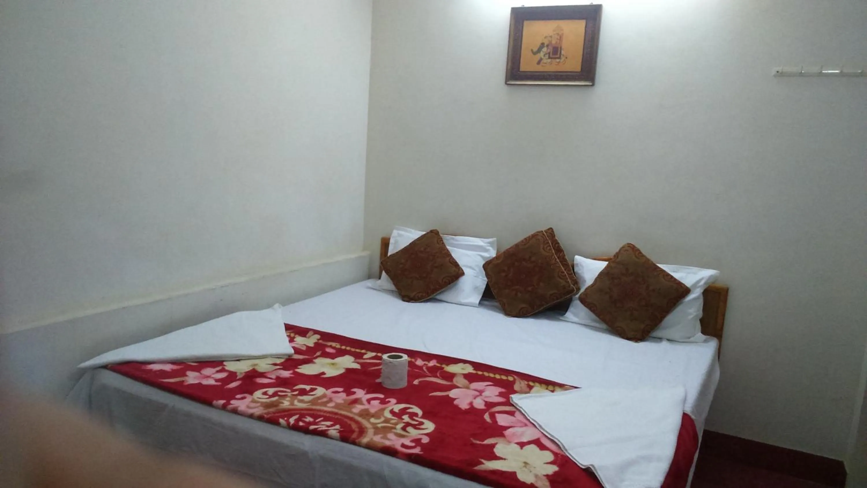 Bed in Gajanand Guest House