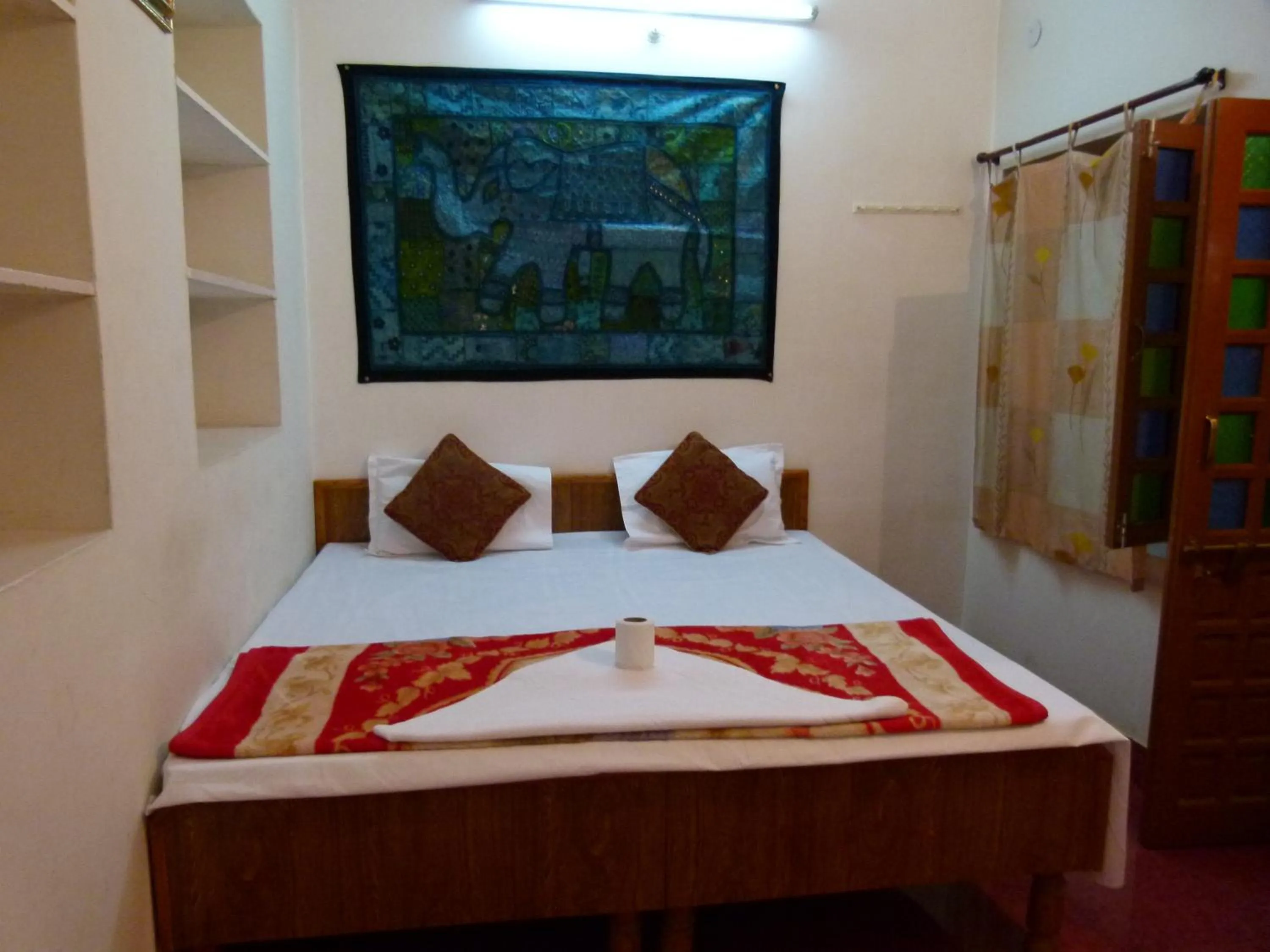 Bed in Gajanand Guest House