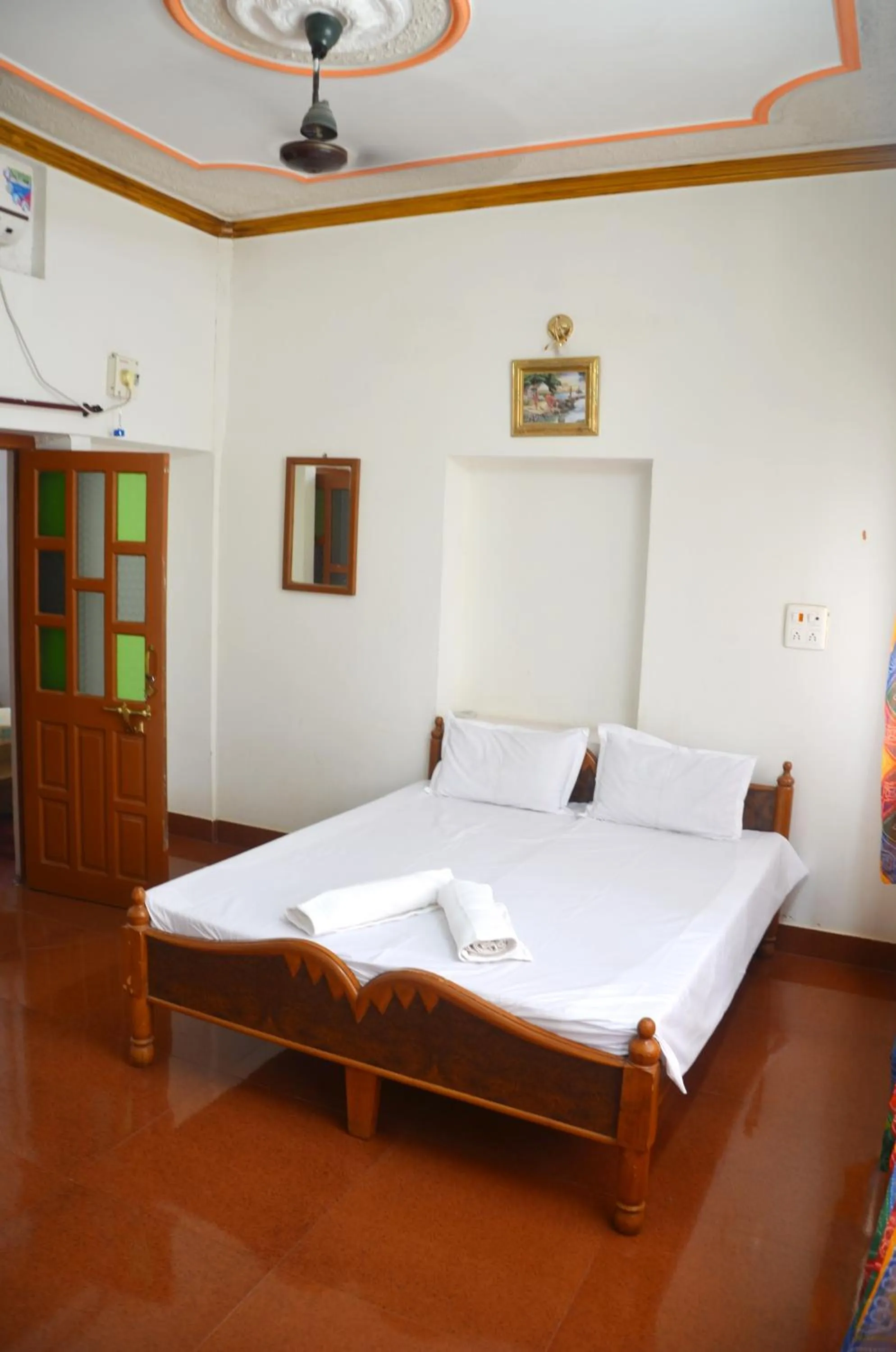 Bed in Gajanand Guest House