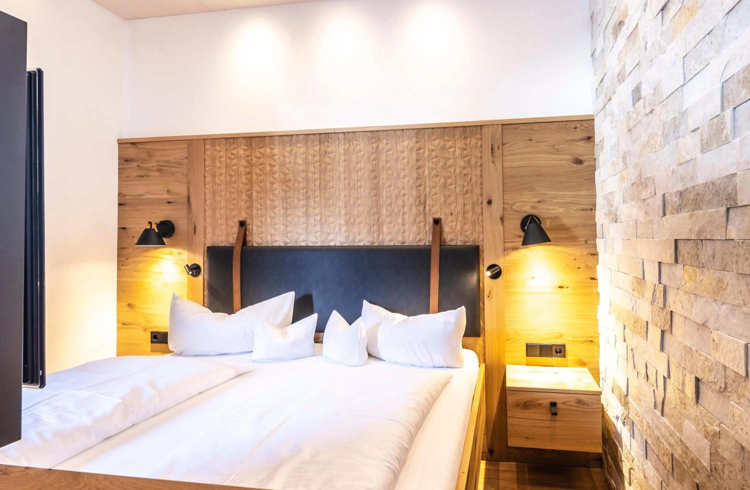 Bed in Alpen Hotel Post