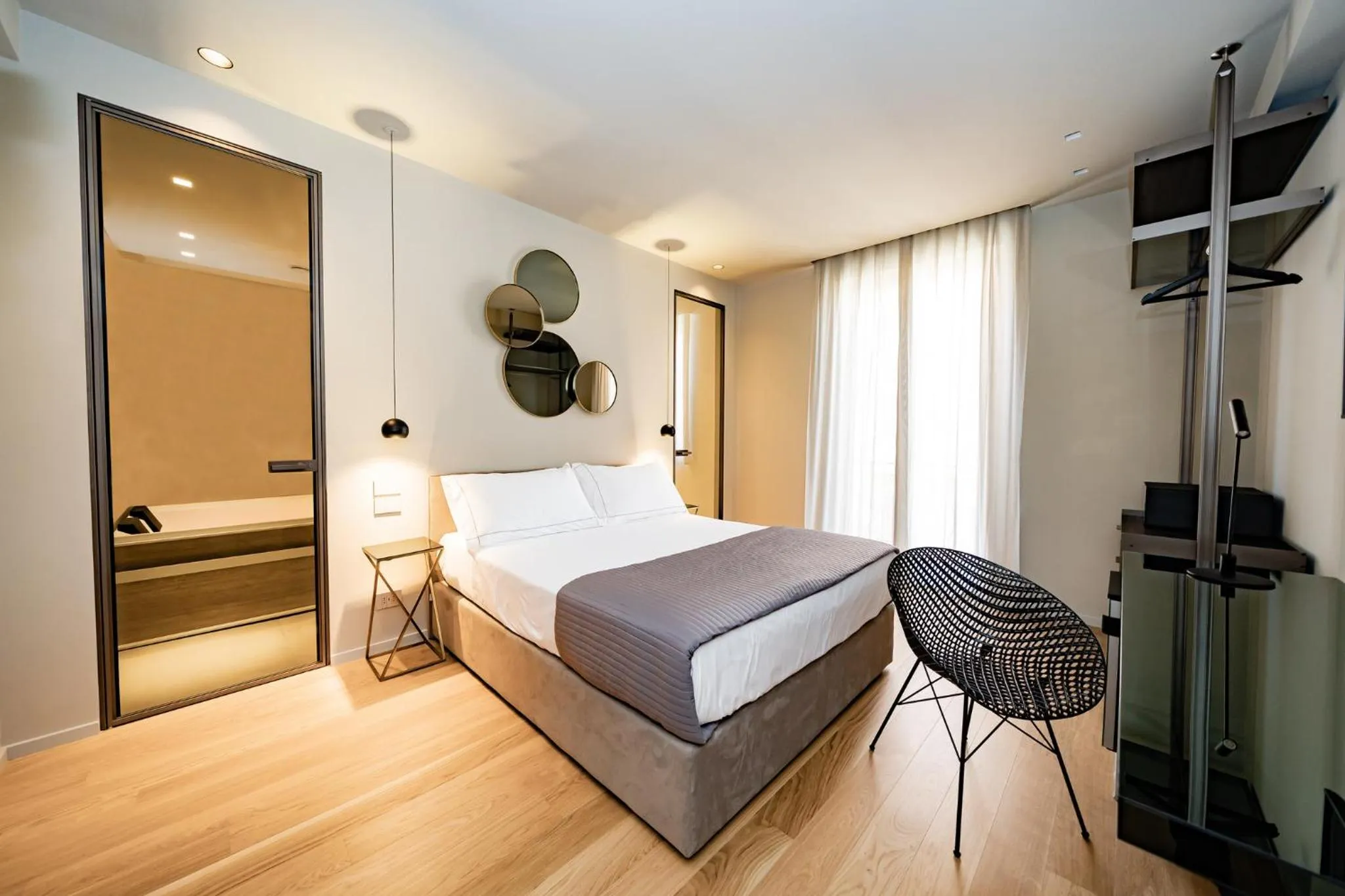 Bed in Elite Accommodations & Hydromassage Pool