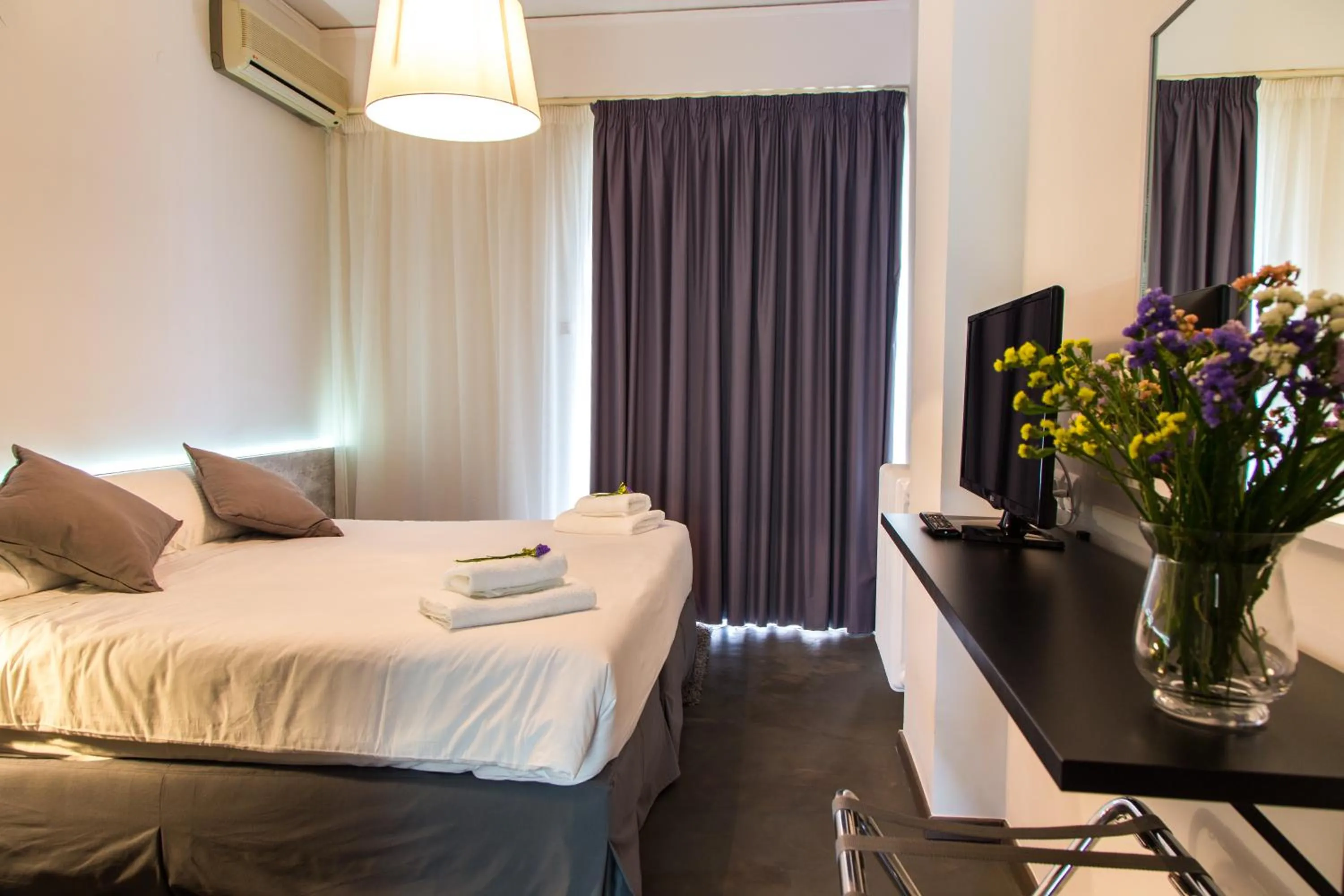 Bed in Alexios Hotel