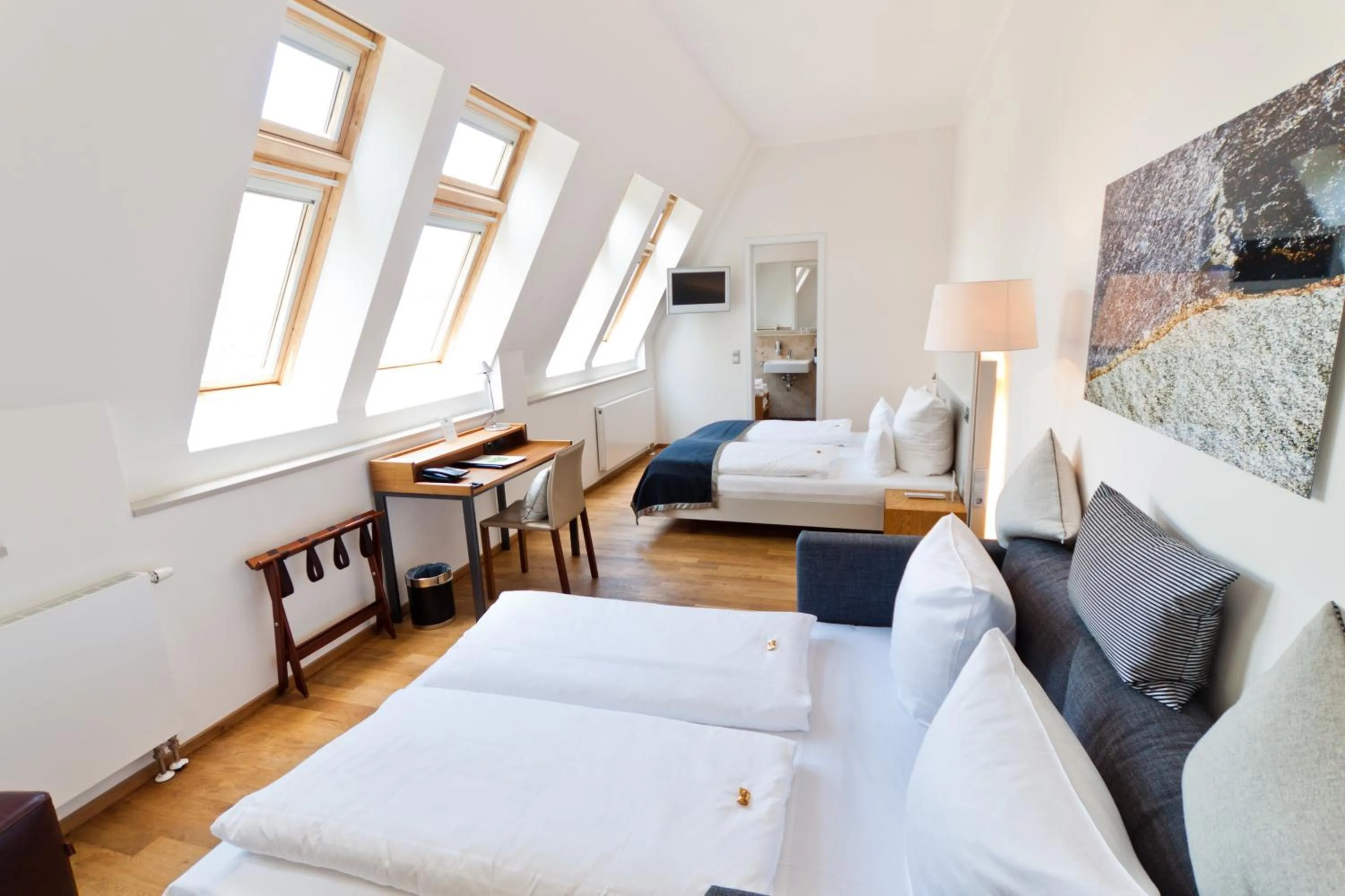 Bed in Qube Hotel Bergheim