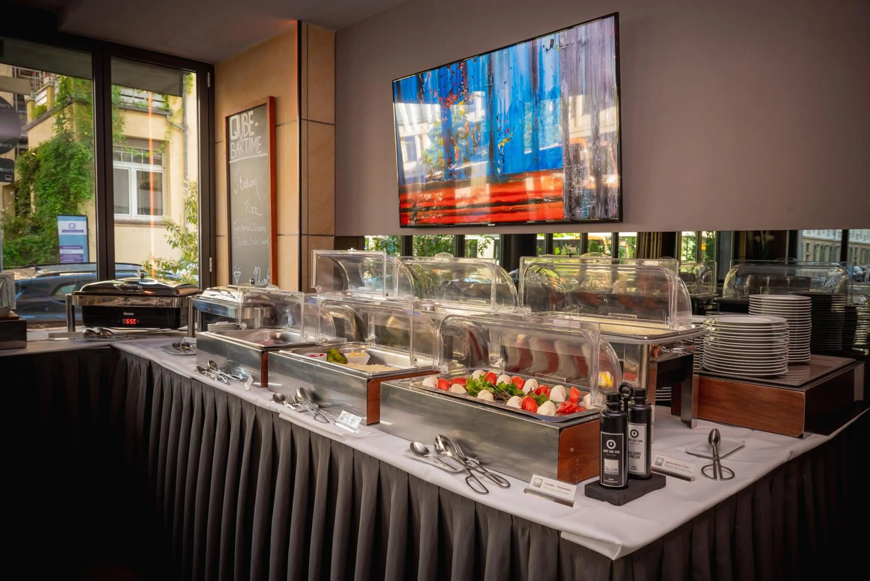 Buffet breakfast in Qube Hotel Bergheim