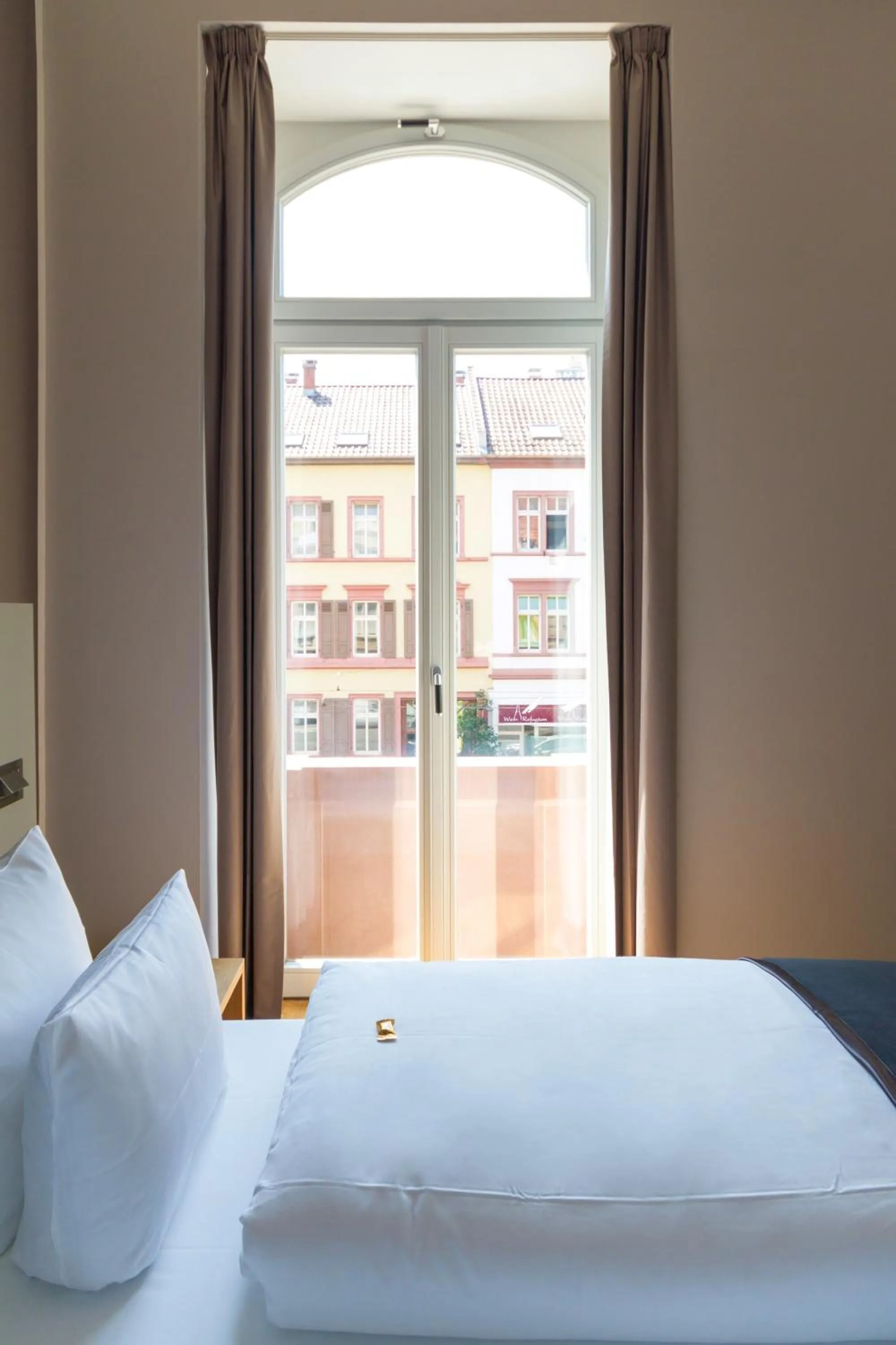 Photo of the whole room, Bed in Qube Hotel Bergheim