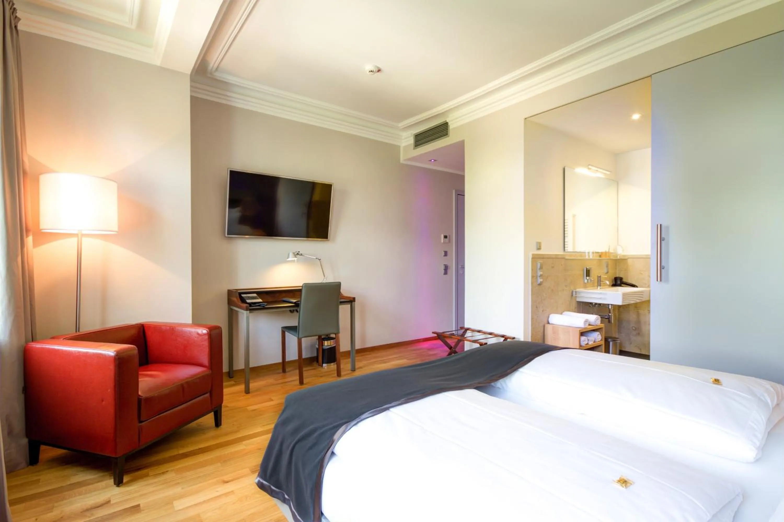 Photo of the whole room, Bed in Qube Hotel Bergheim