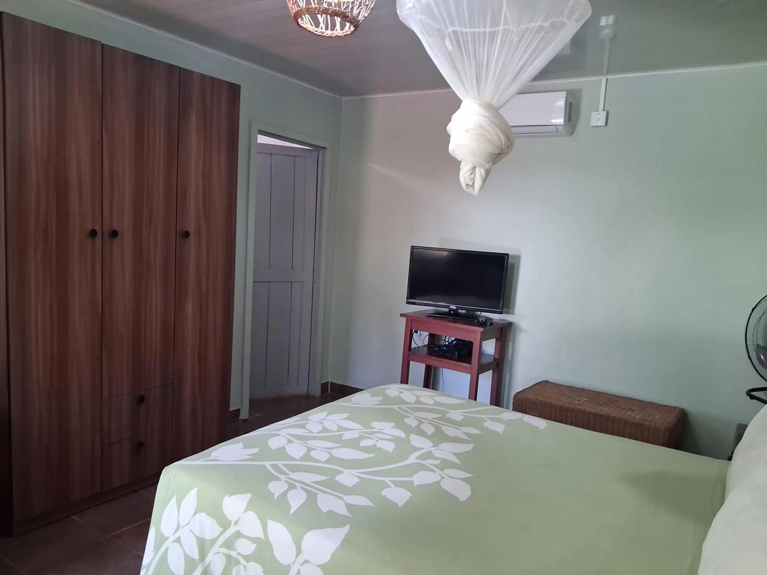 Bed in Gloria's Bed and Breakfast