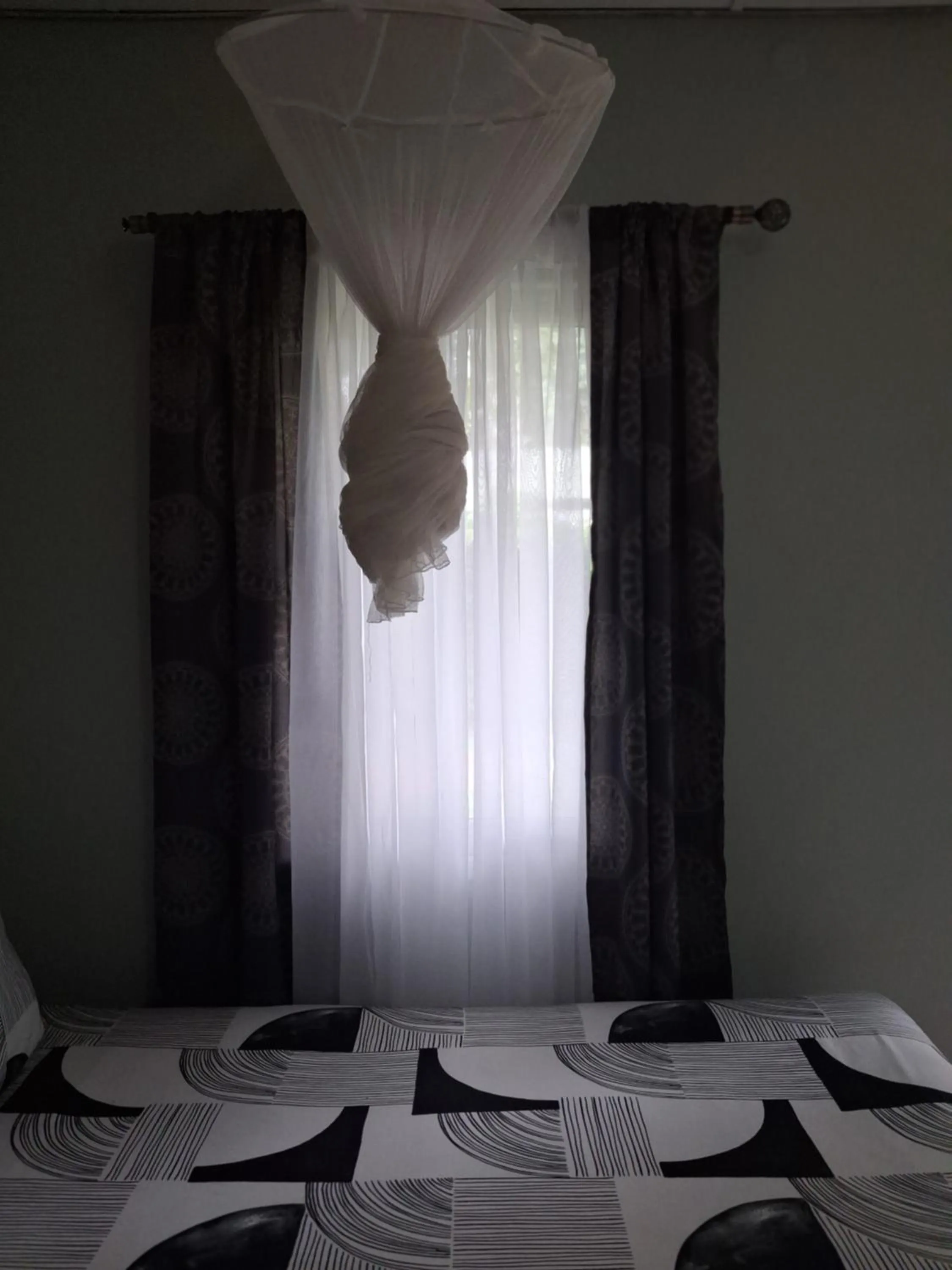 Bed in Gloria's Bed and Breakfast