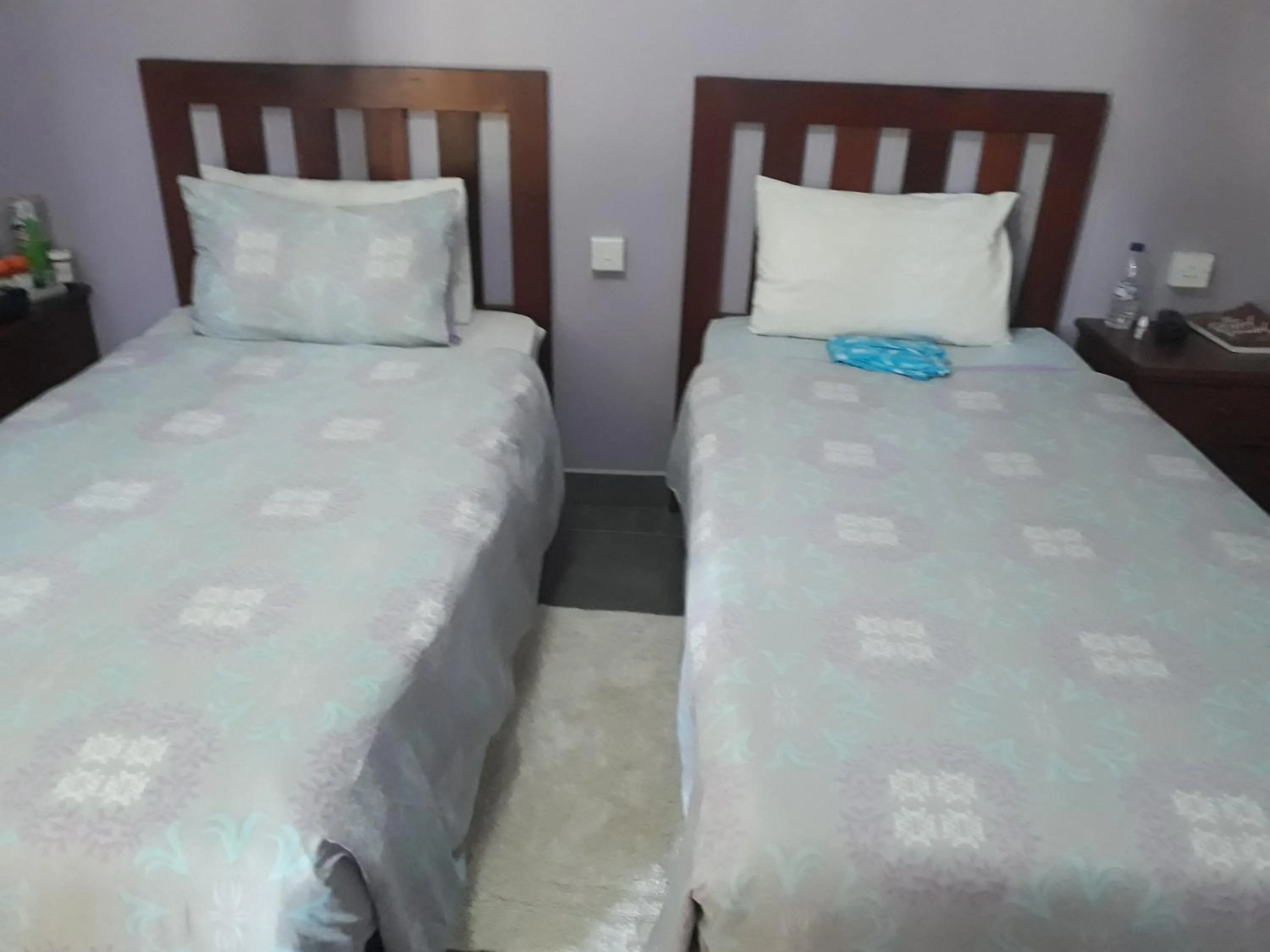 Bed in Gloria's Bed and Breakfast