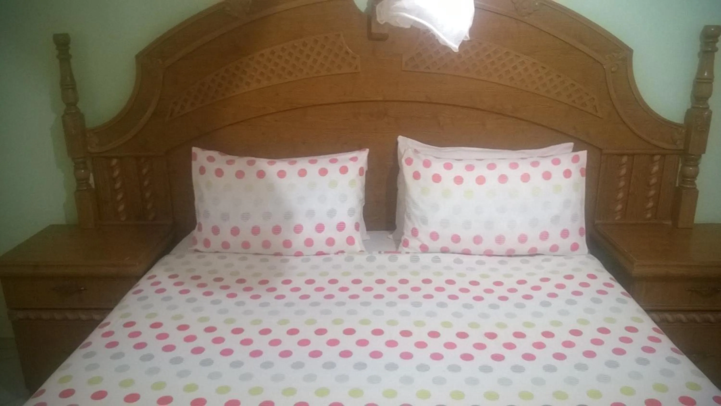 Bed in Gloria's Bed and Breakfast