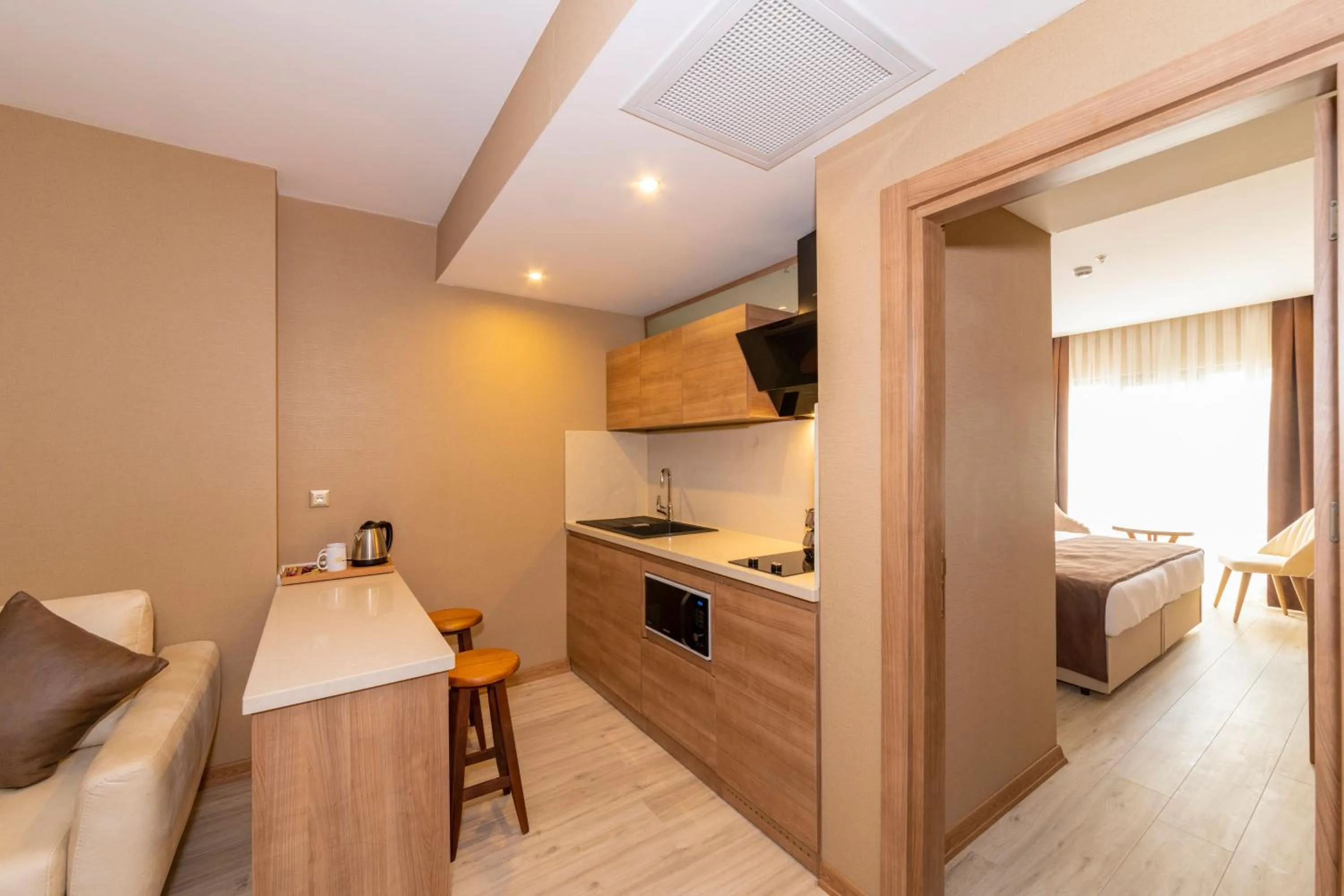 Kitchen or kitchenette, Bed in 38 Hotel