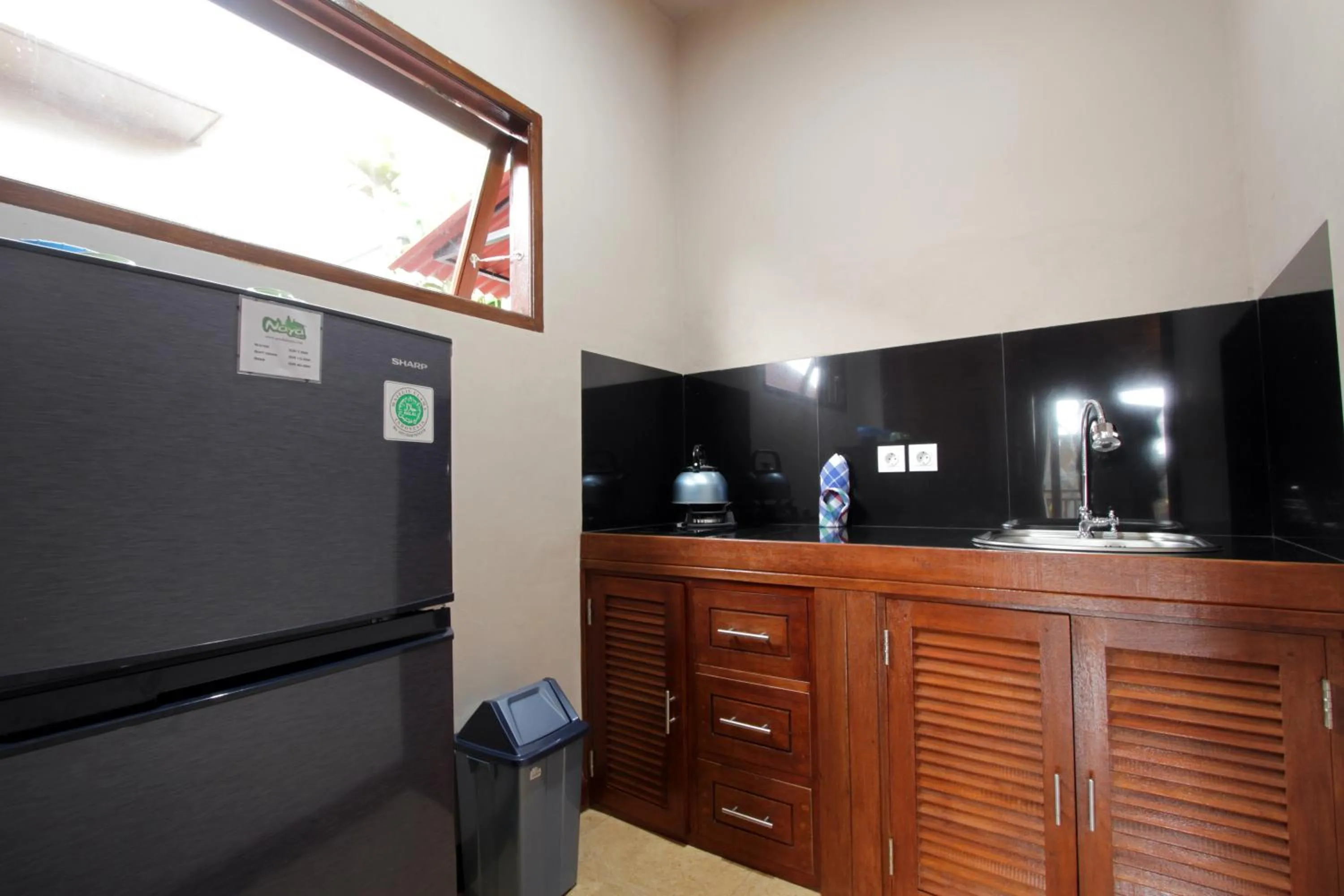 Kitchen or kitchenette in Pondok Naya Ubud