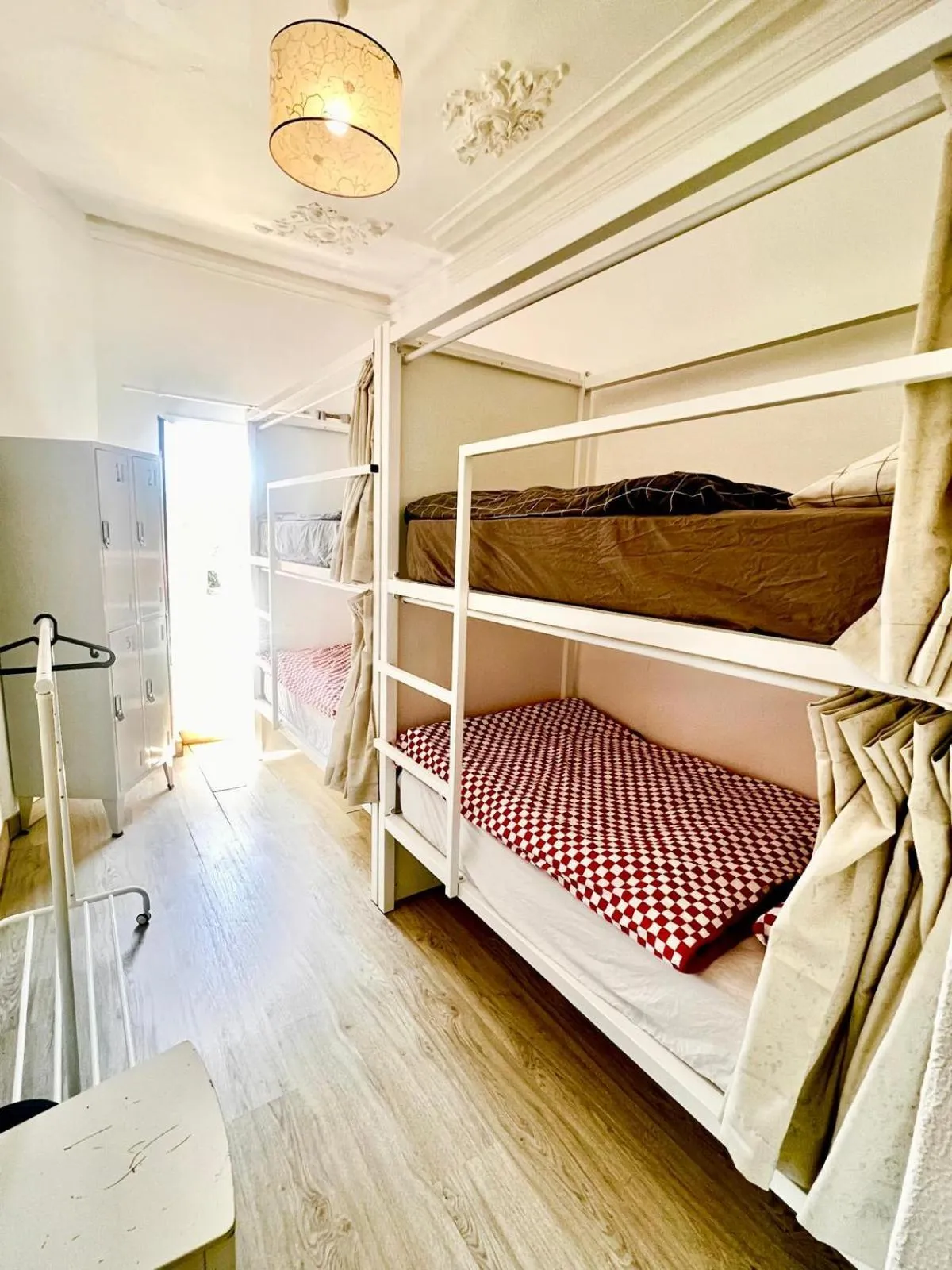 Bed in SwissPorto Guest House