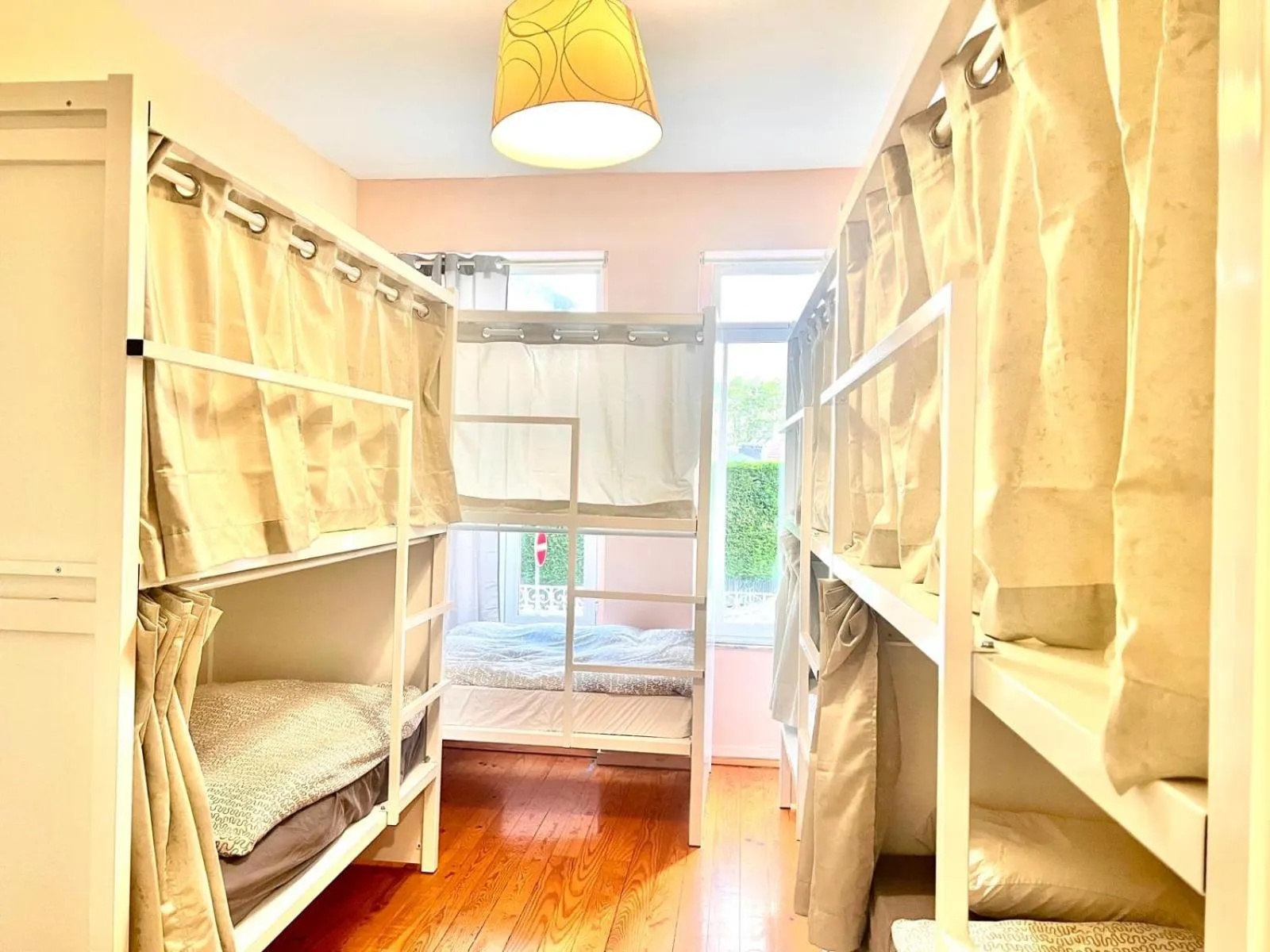 Bed in SwissPorto Guest House