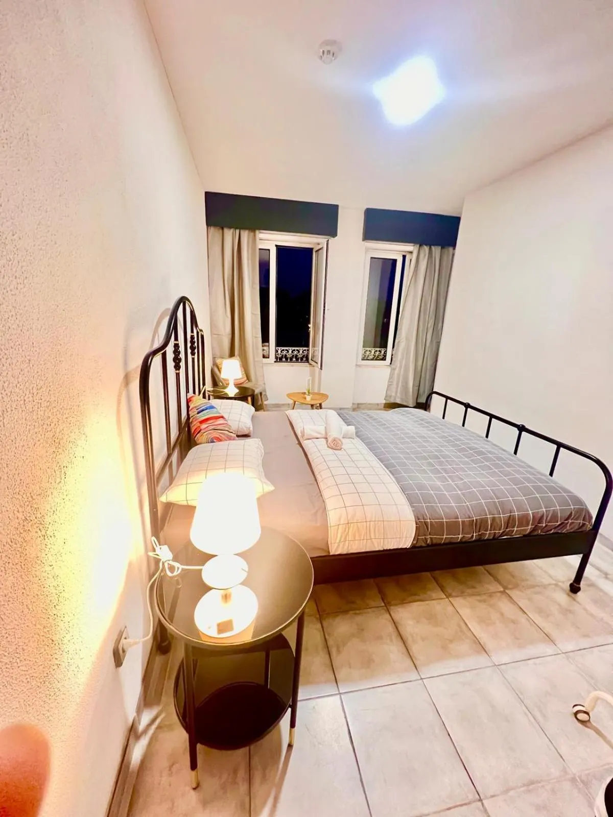 Bed in SwissPorto Guest House