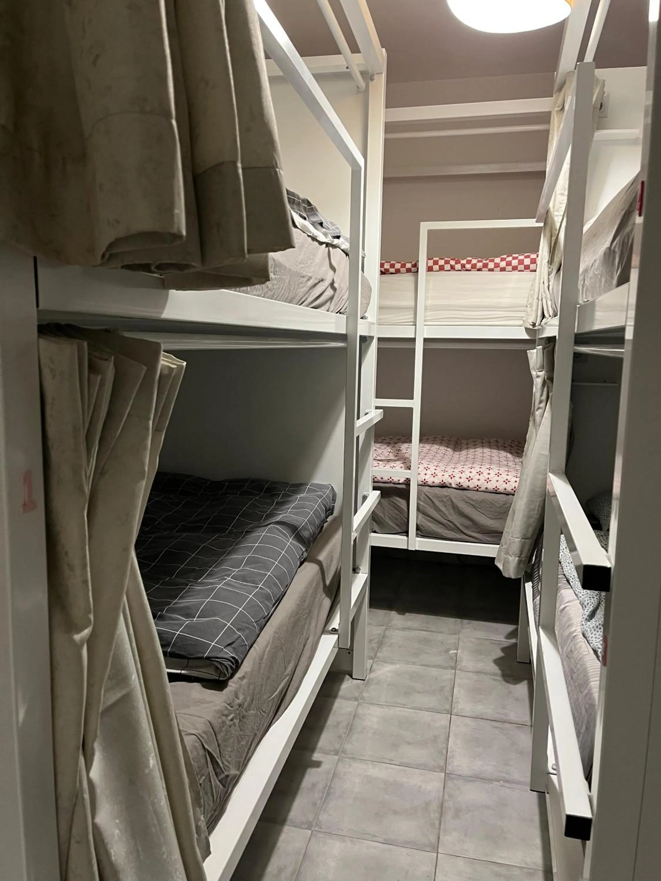 Bed in SwissPorto Guest House