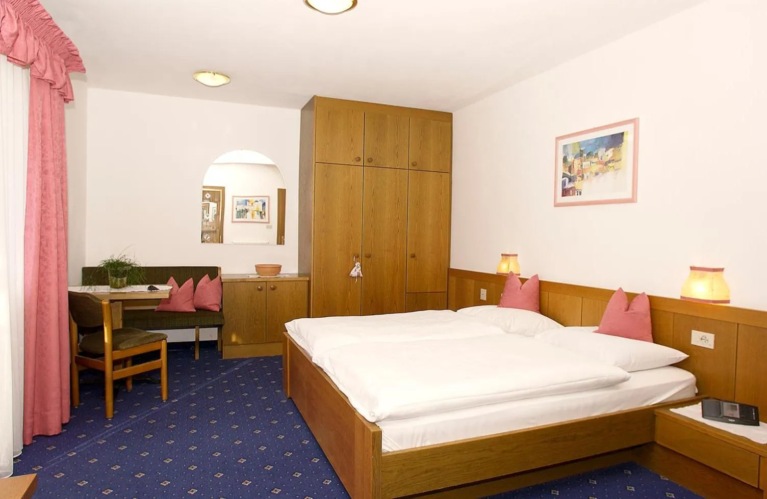 Property building, Bed in PALMENGARTEN Hotel Gstör