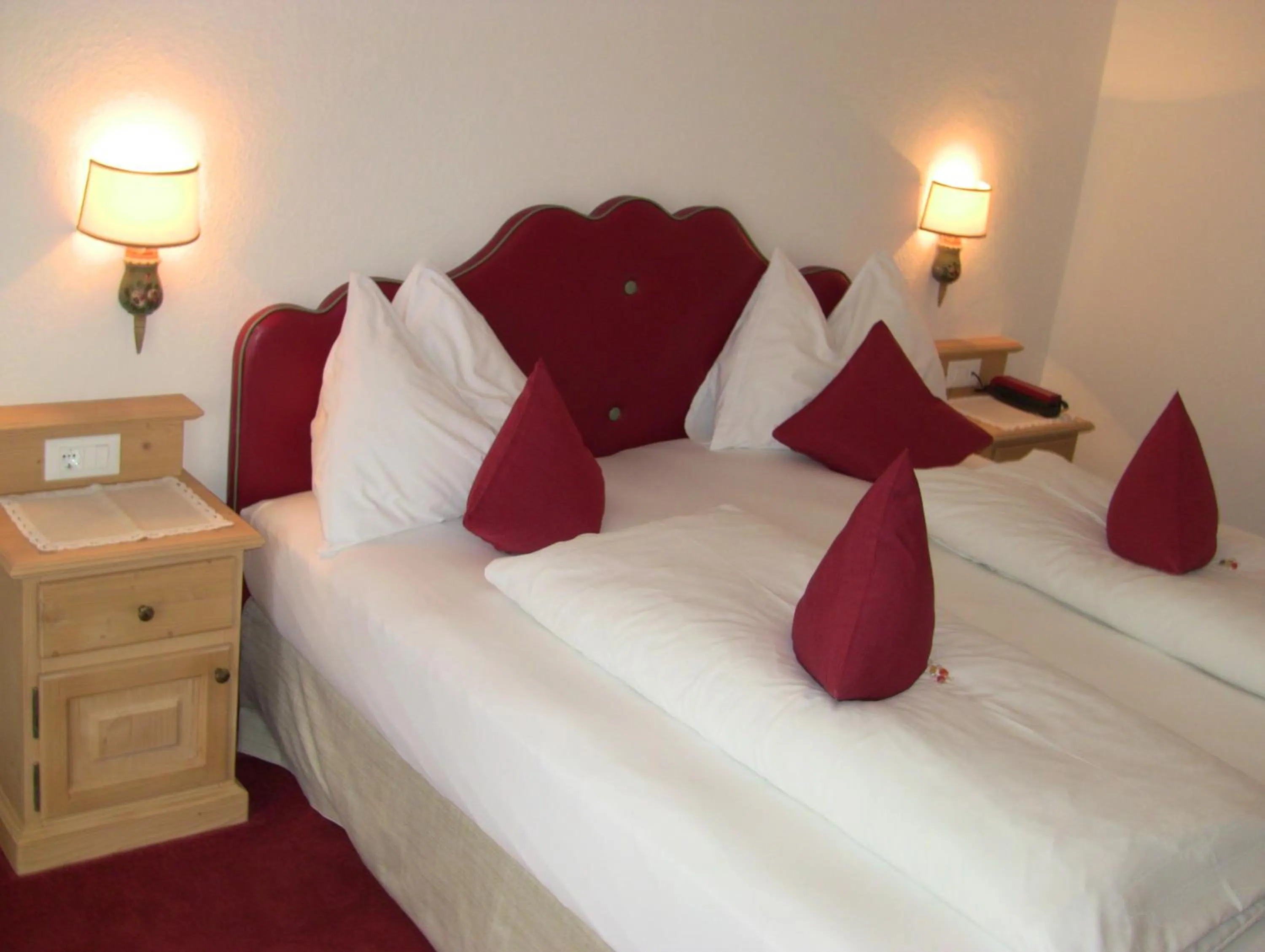 Decorative detail, Bed in PALMENGARTEN Hotel Gstör