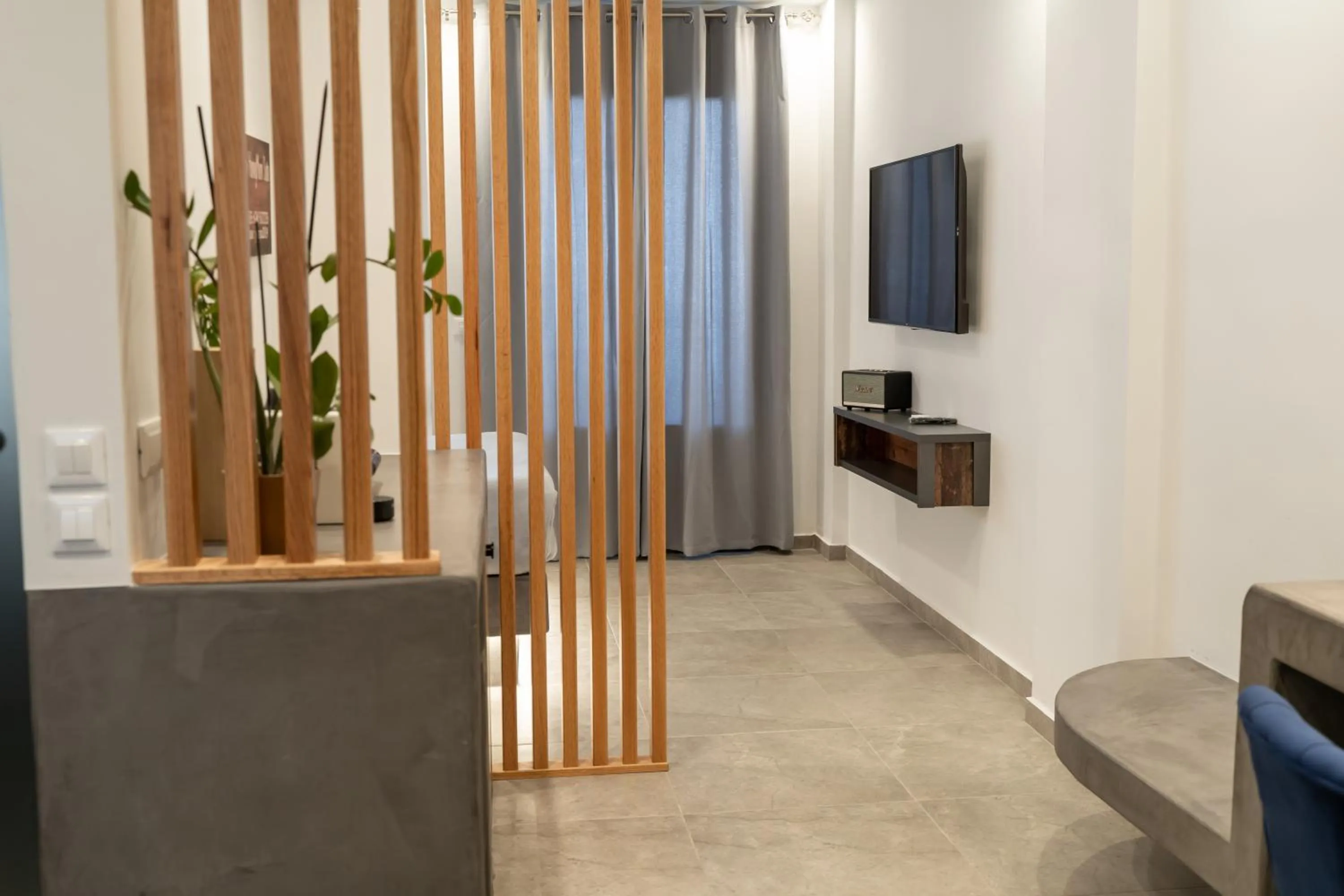 TV and multimedia in George & Joanna Suites Santorini