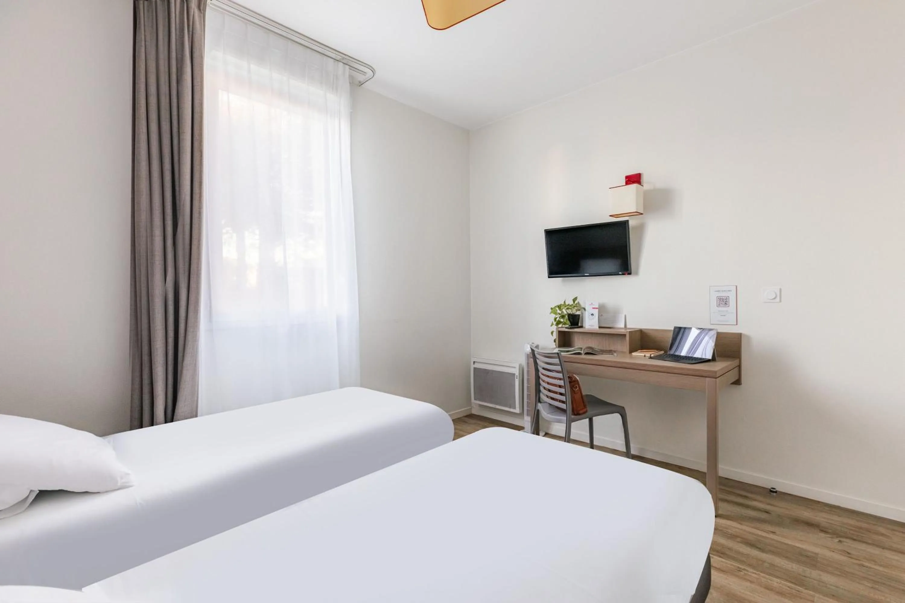 Bed in Appart'City Confort Saint-Nazaire Océan