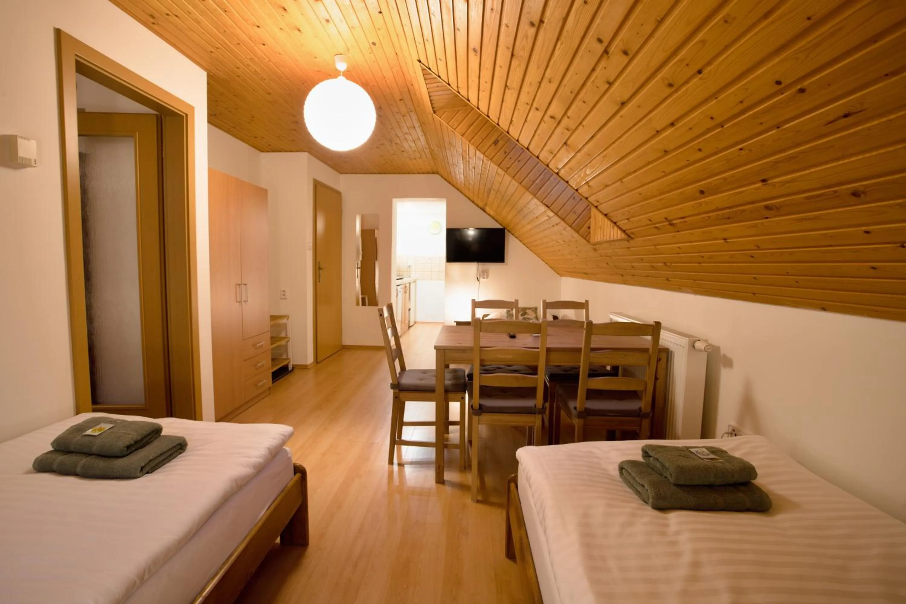 Living room, Bed in Apartmány Bramborka