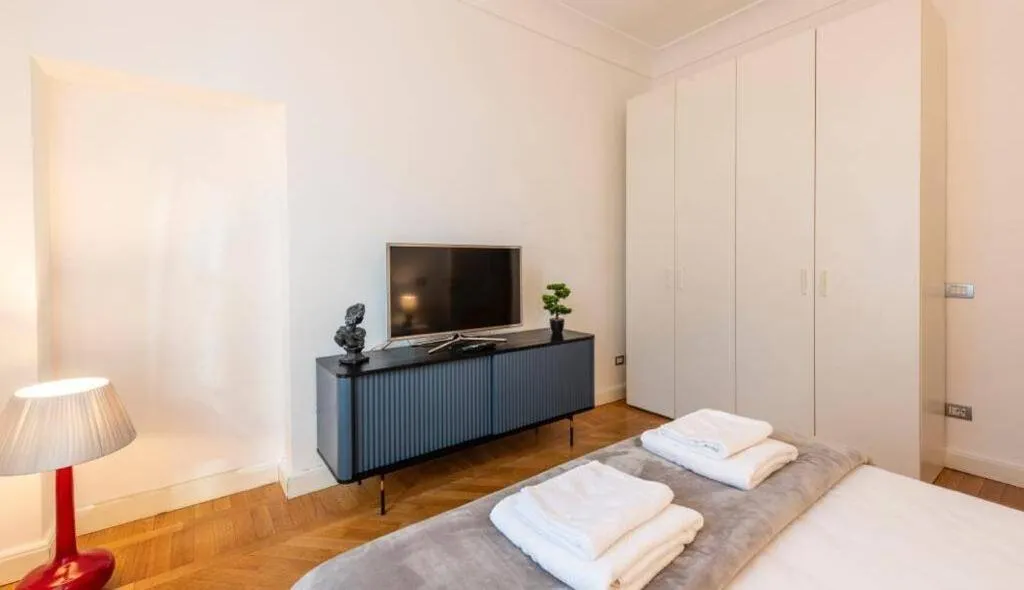 Bedroom, Bed in Milan Royal Suites - Centro