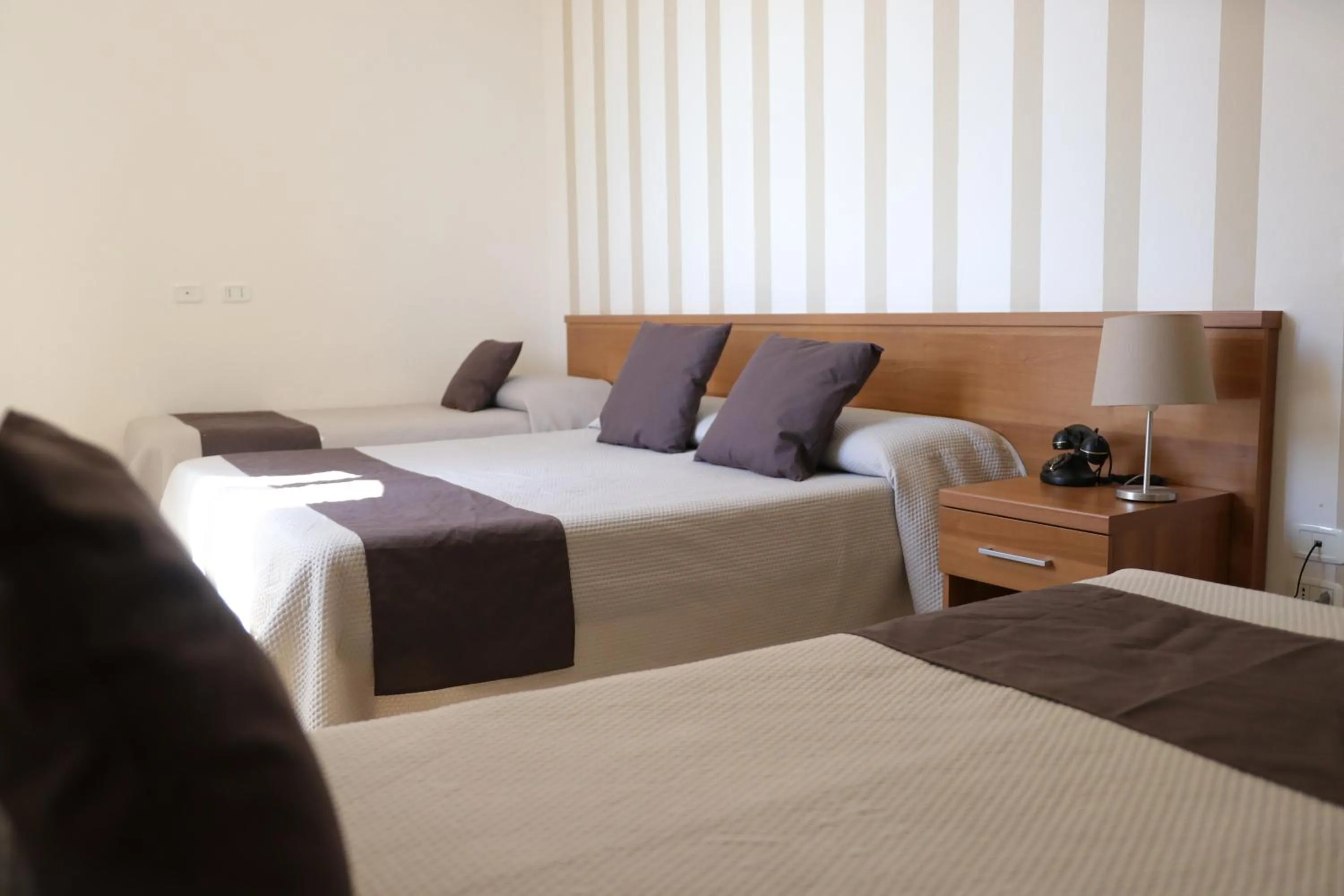 Bed in Hotel Castel Miramonti