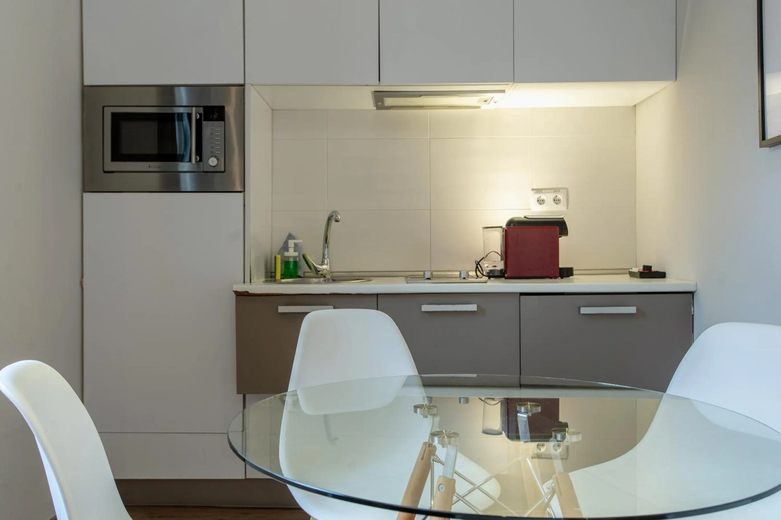 Kitchen or kitchenette in Apartamentos Nickel