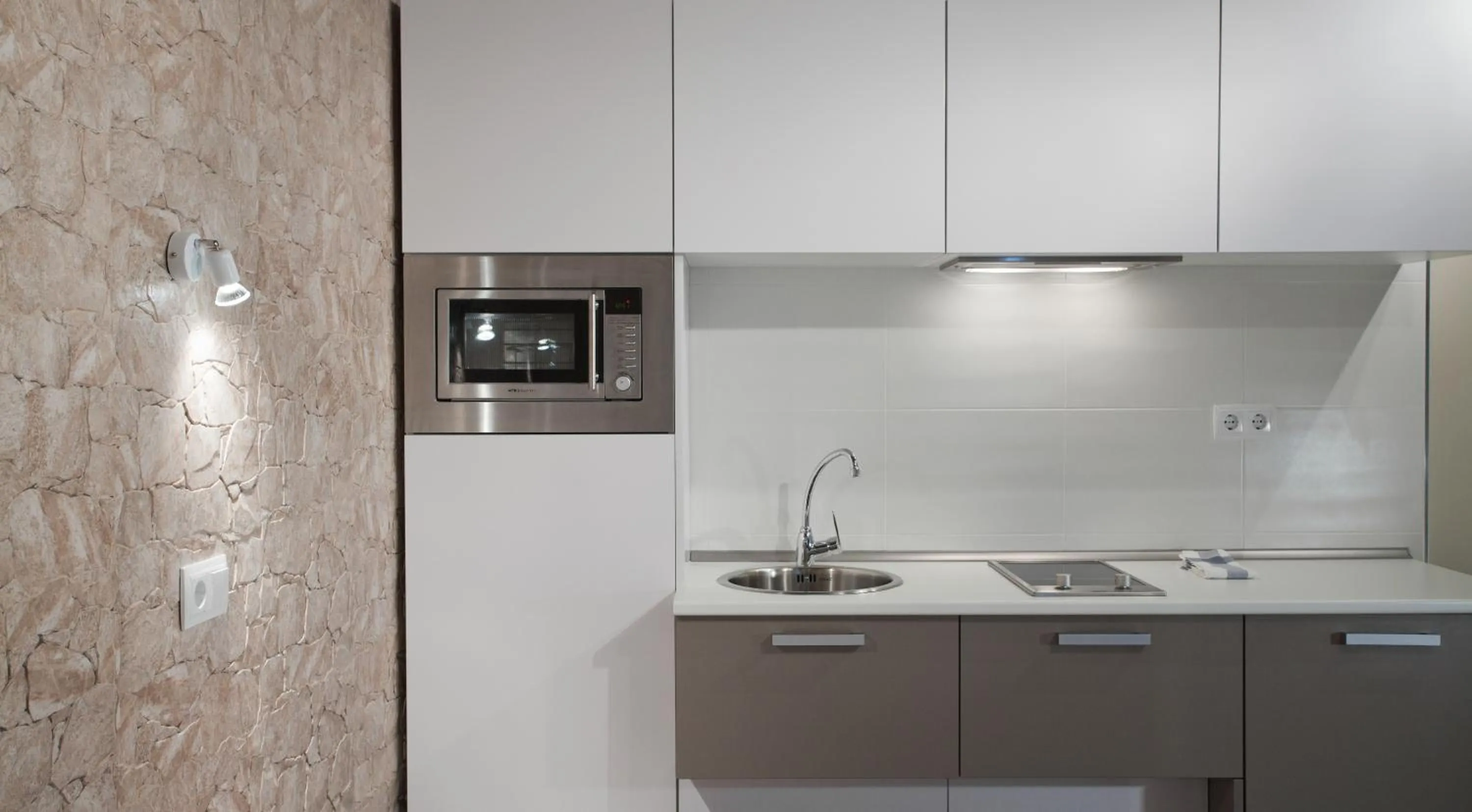 Kitchen or kitchenette in Apartamentos Nickel