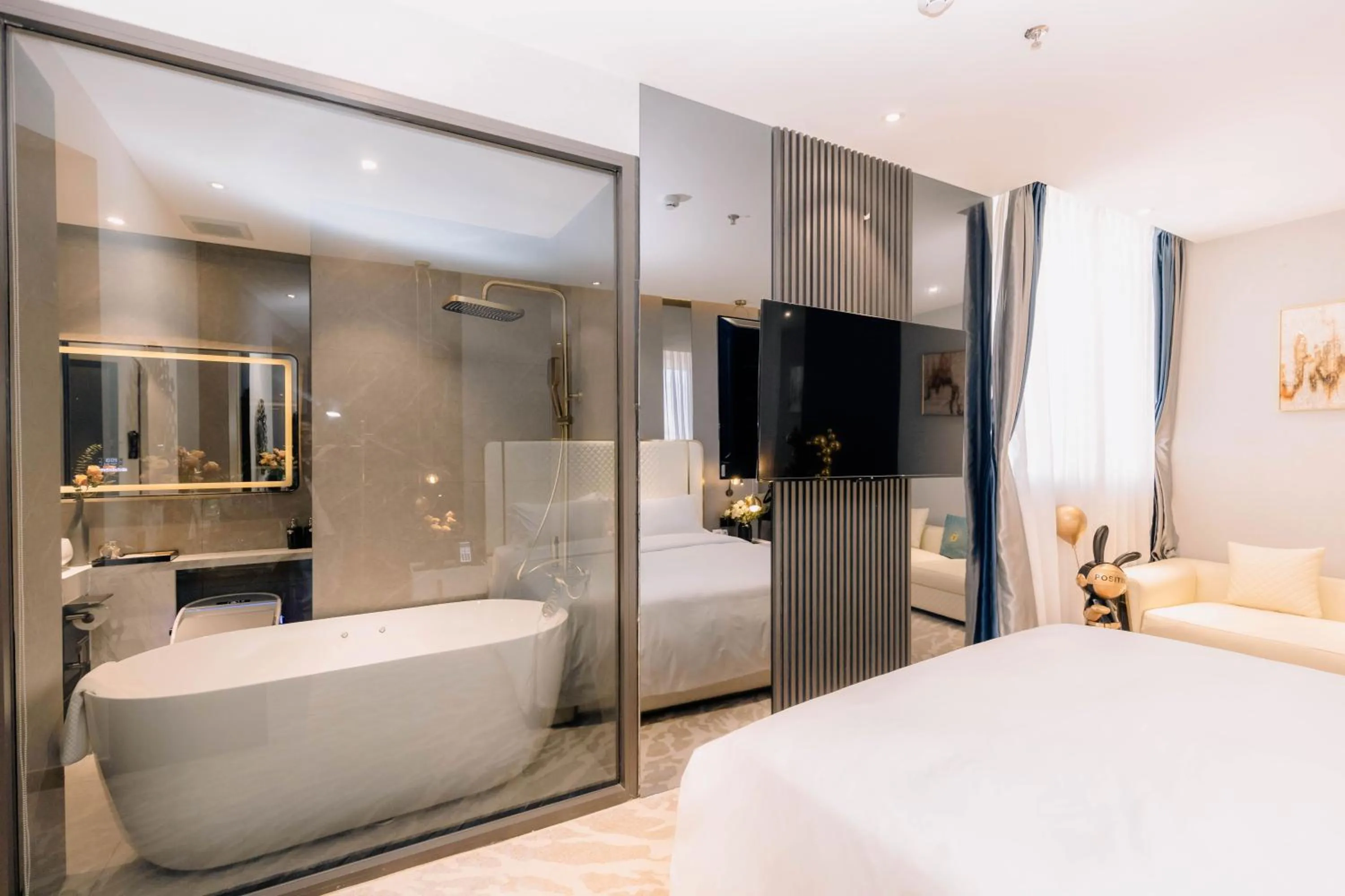 Shower, Bed in New Century Dalat Hotel