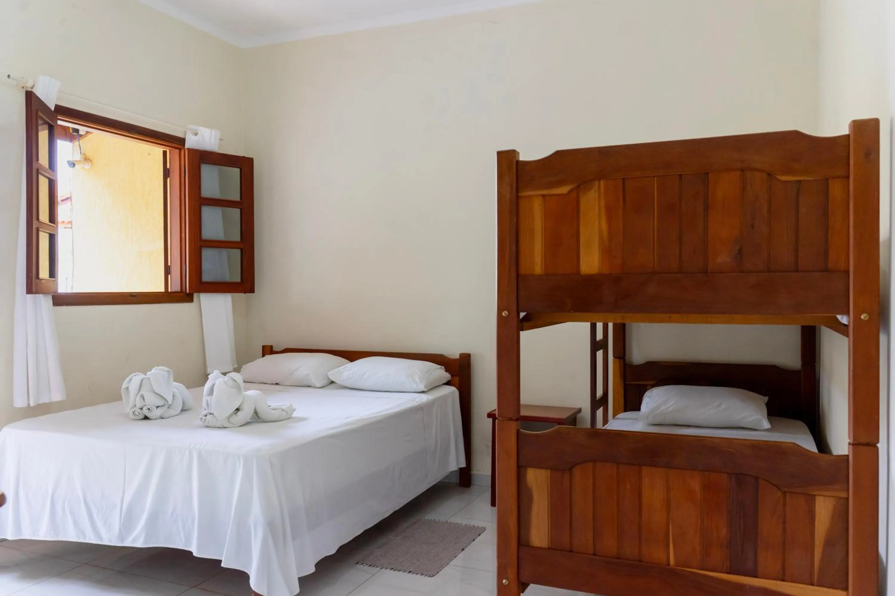 Bed in Pousada Voo das Garças