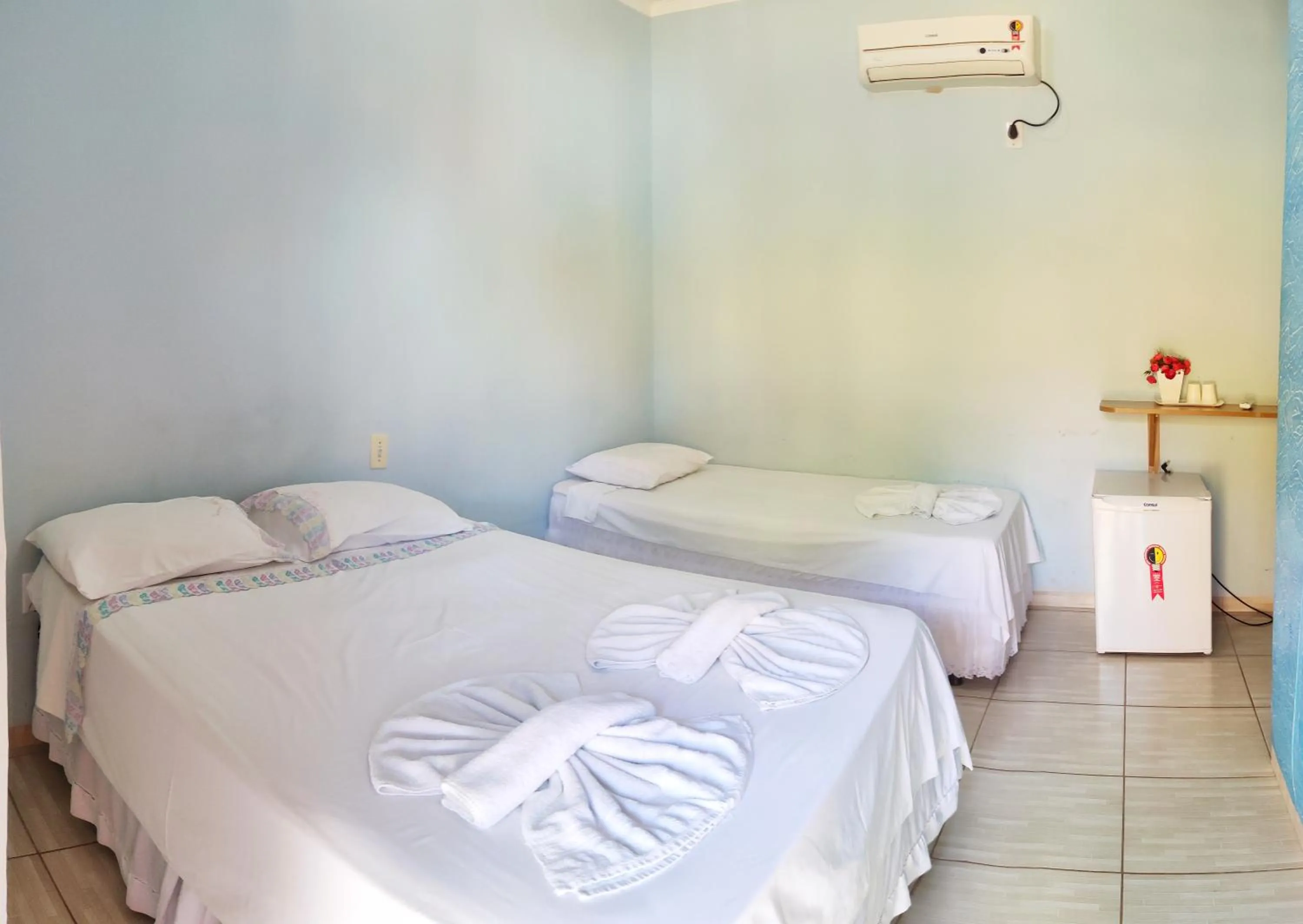 Bed in Pousada Voo das Garças