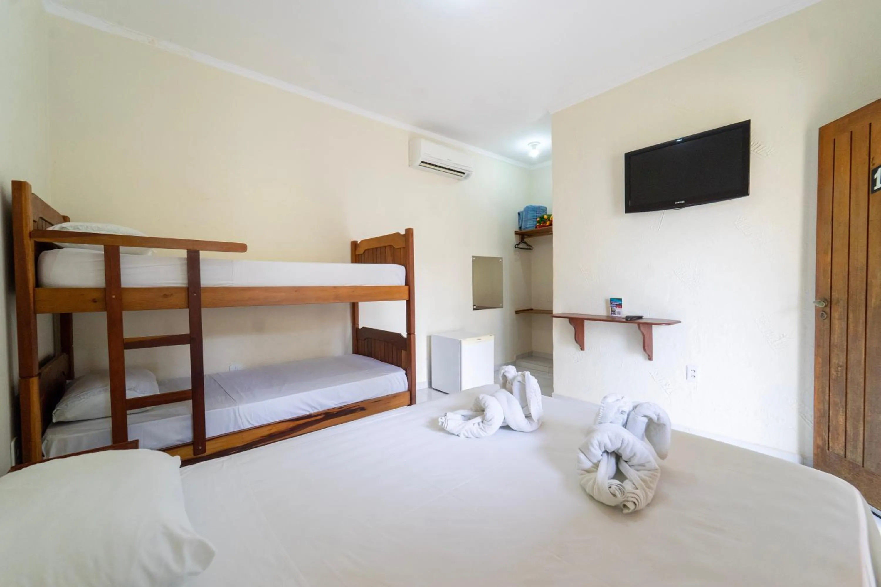 Bed in Pousada Voo das Garças