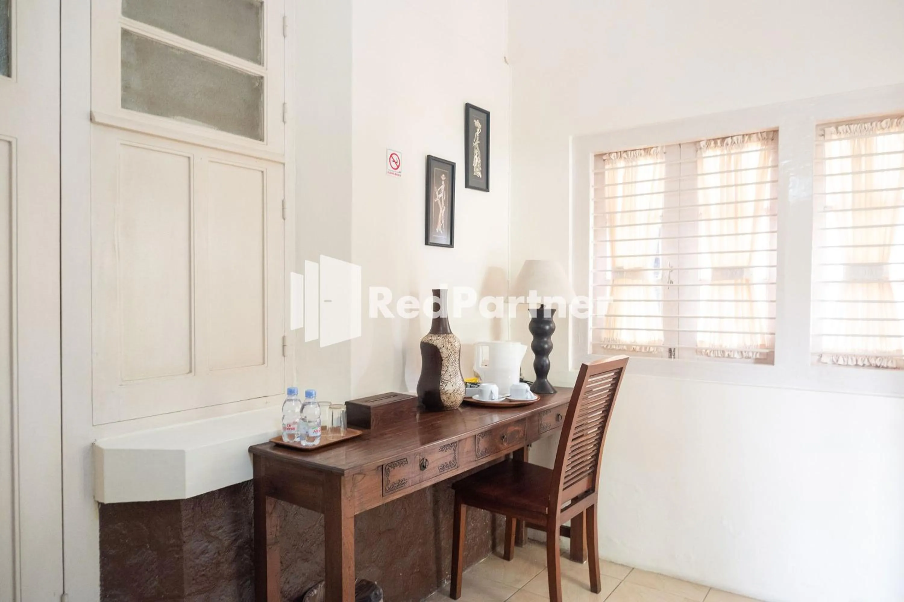 Bedroom in Monginsidi Guest House Syariah Malioboro Yogyakarta Mitra RedDoorz