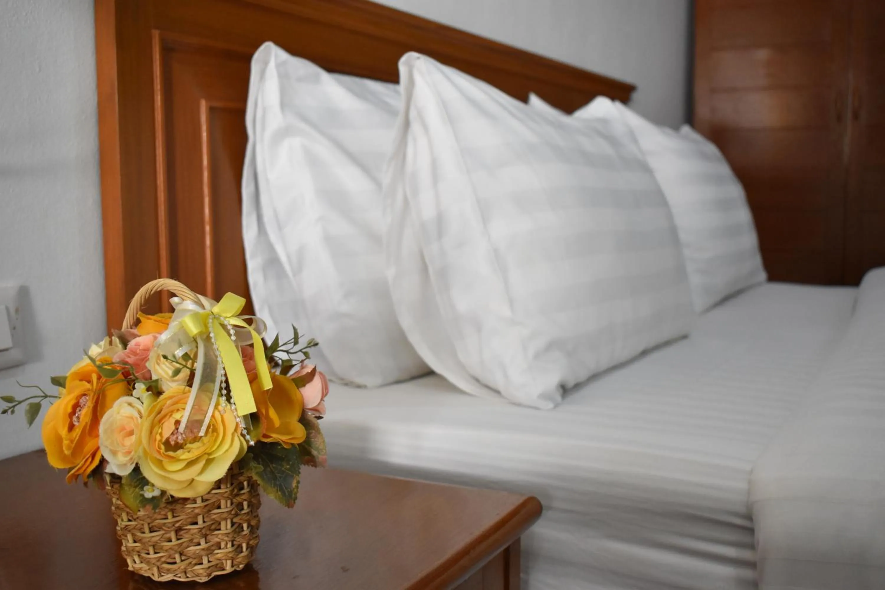 Bed in Sala Bua Room