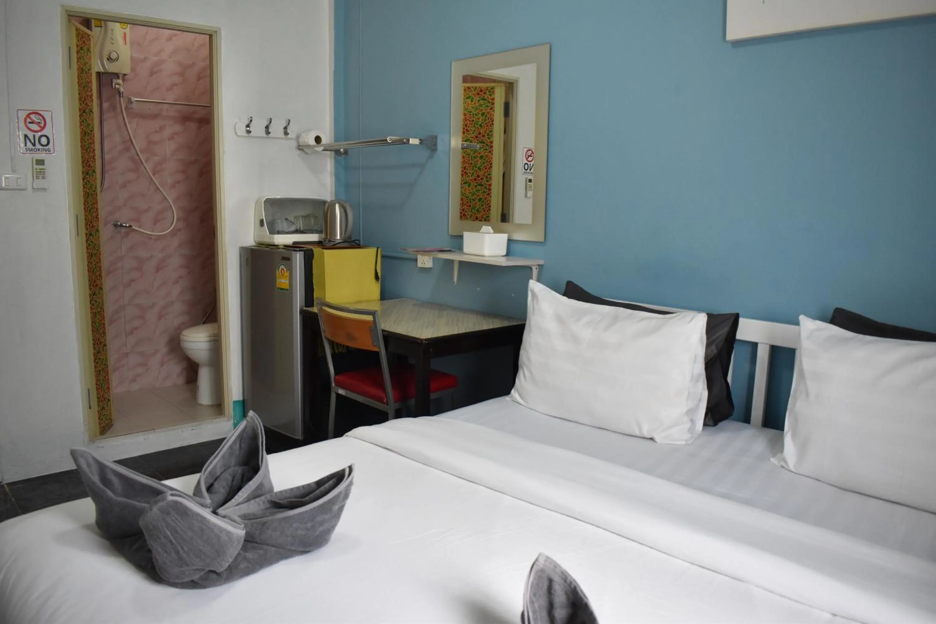 Bed in Sala Bua Room