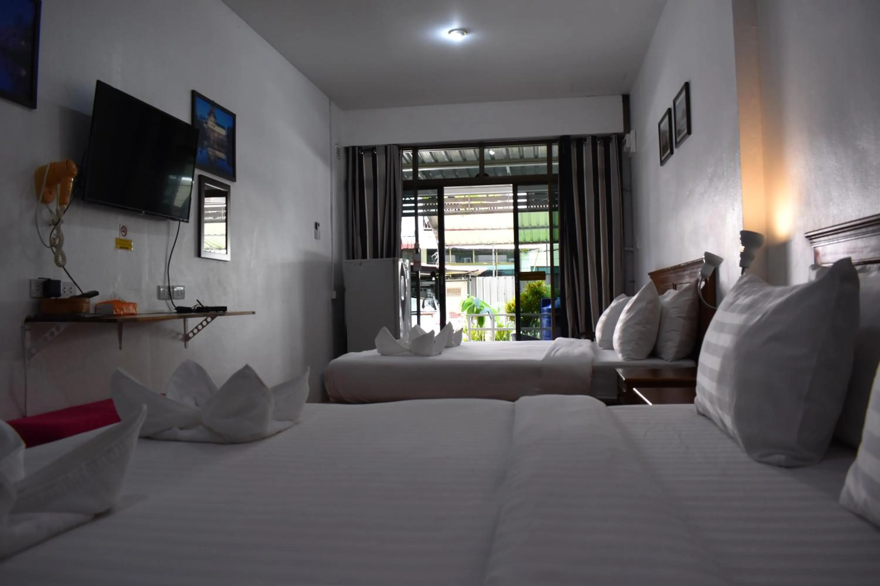 Photo of the whole room, Bed in Sala Bua Room