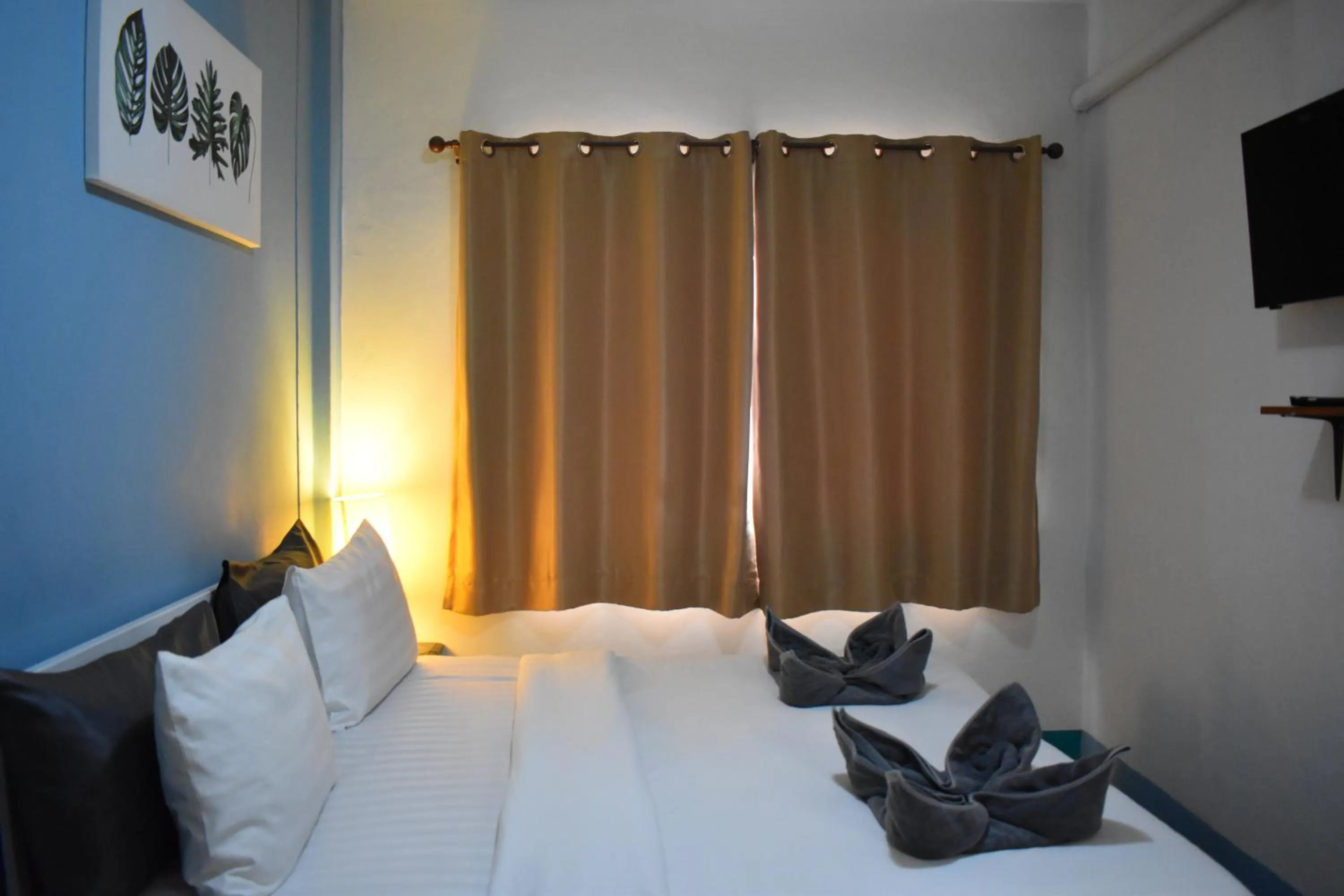 Bed in Sala Bua Room