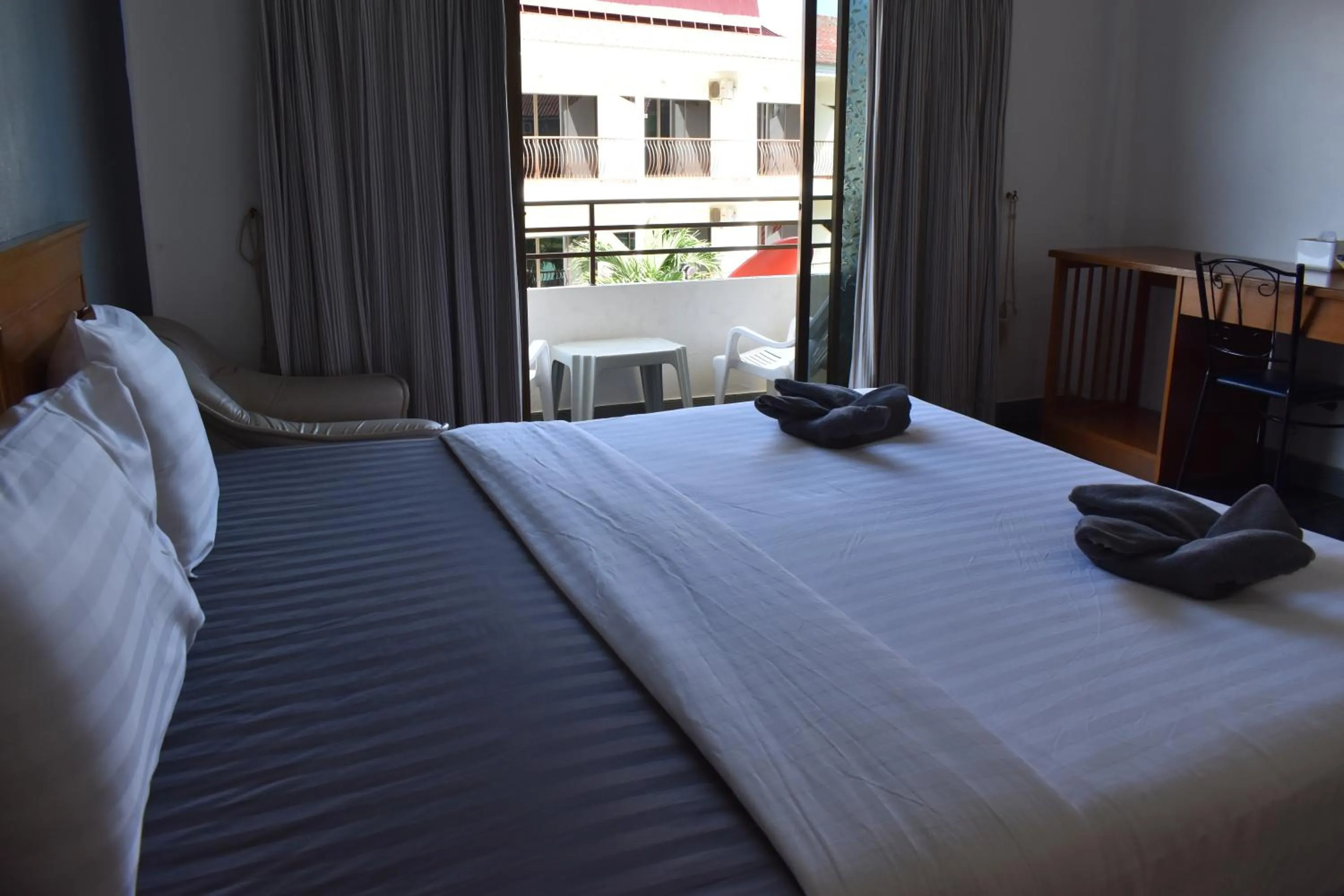 Bed in Sala Bua Room