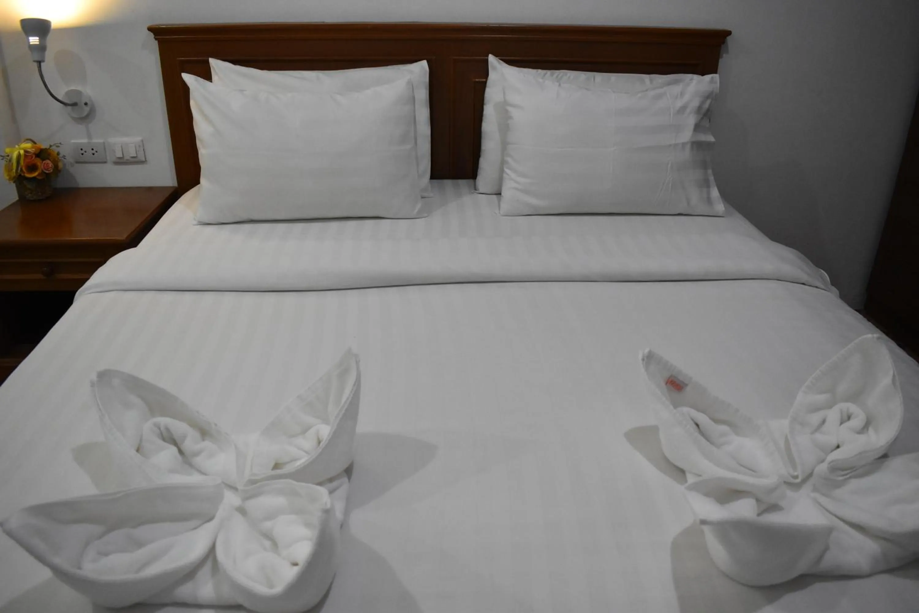 Bed in Sala Bua Room