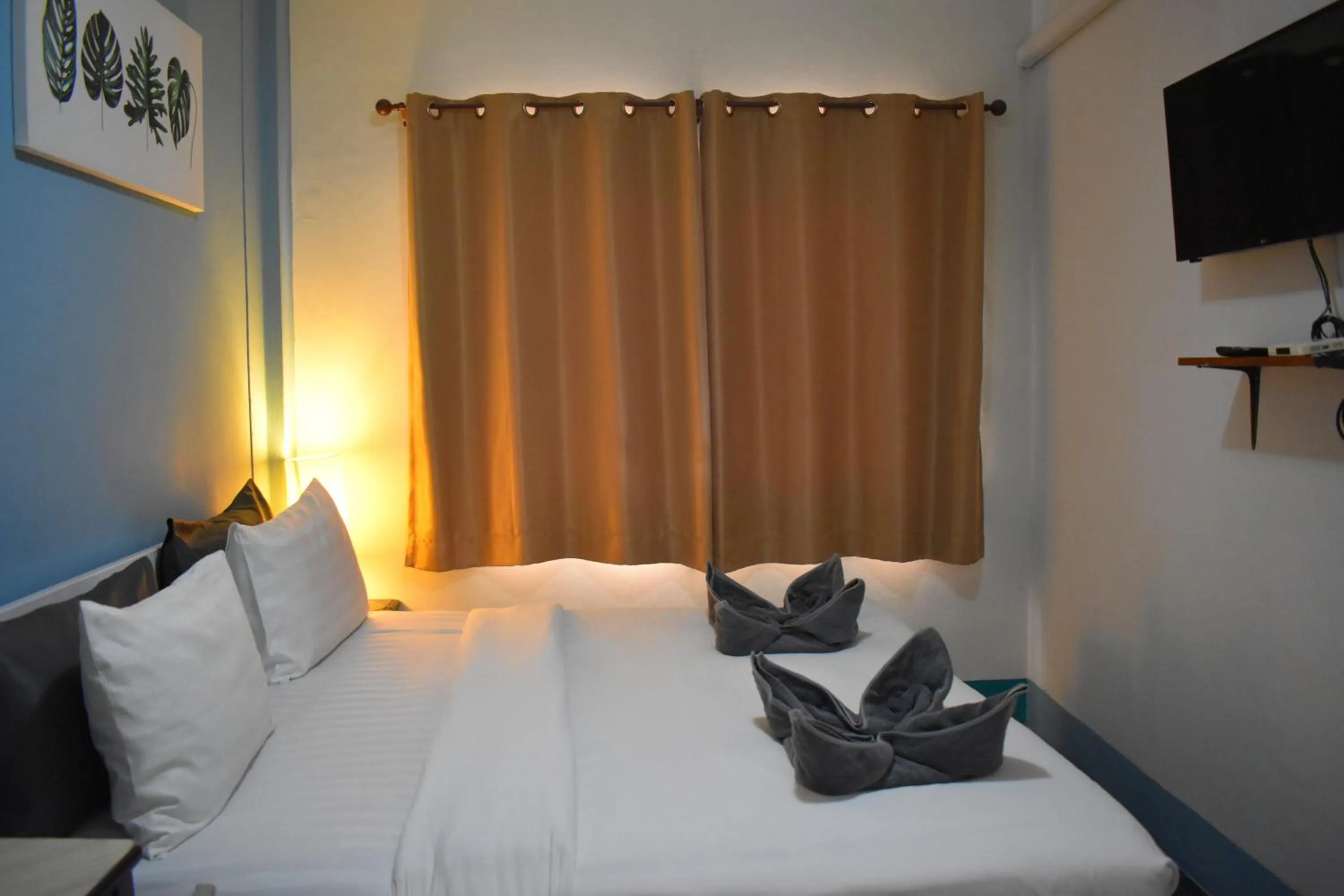 Bed in Sala Bua Room