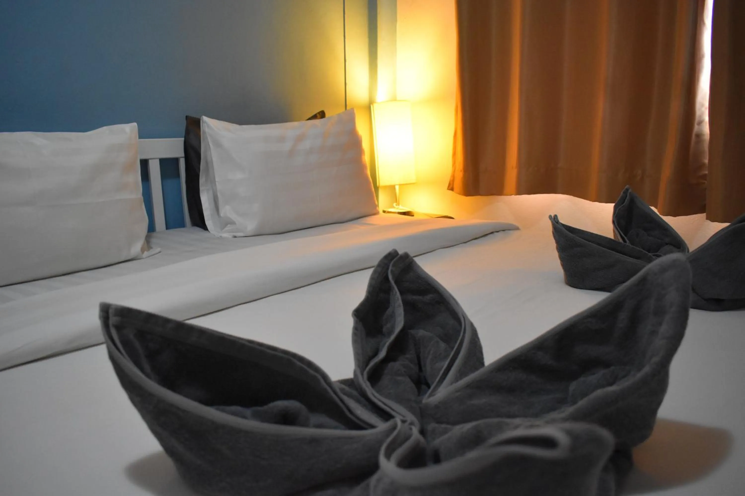 Bed in Sala Bua Room