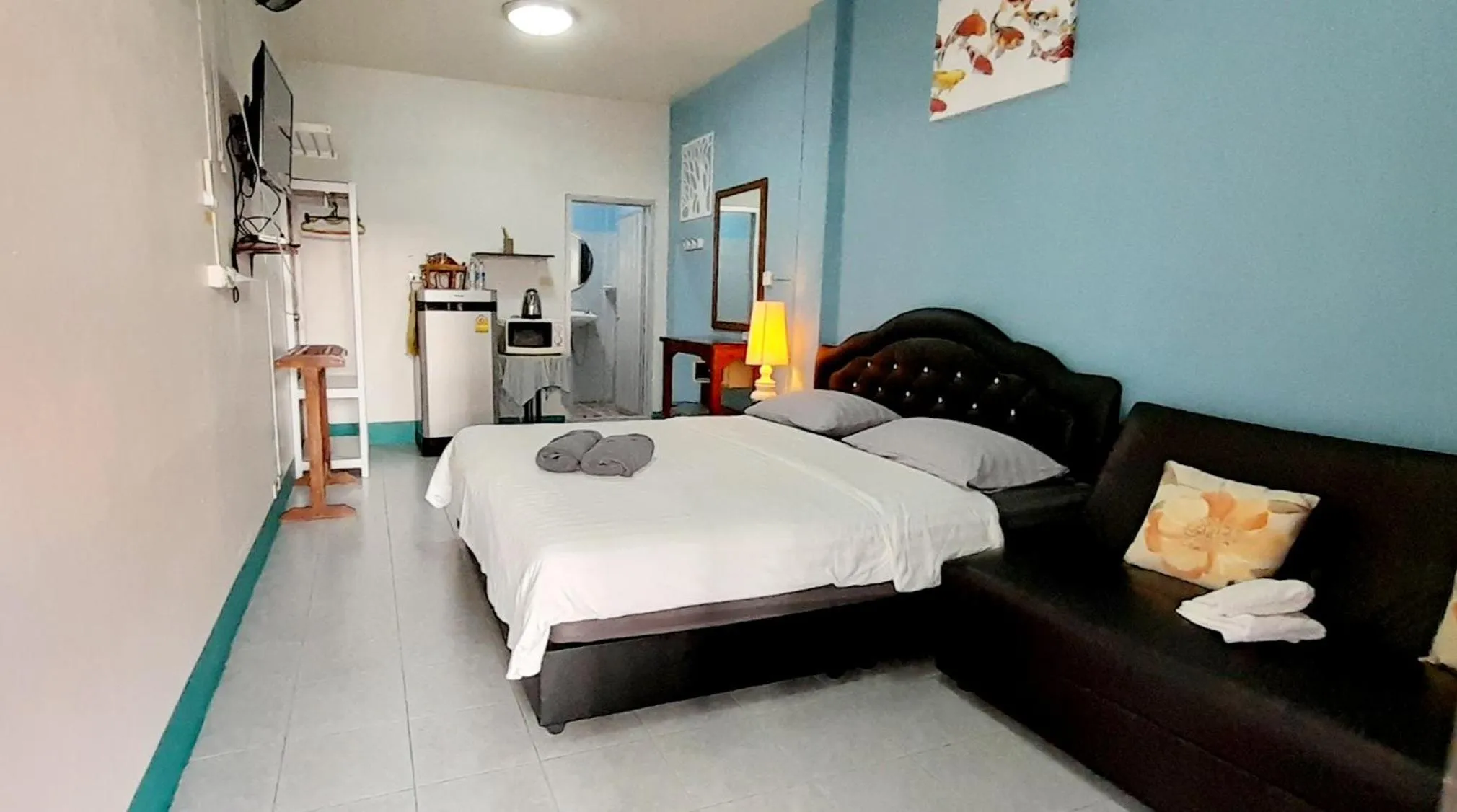 Photo of the whole room, Bed in Sala Bua Room