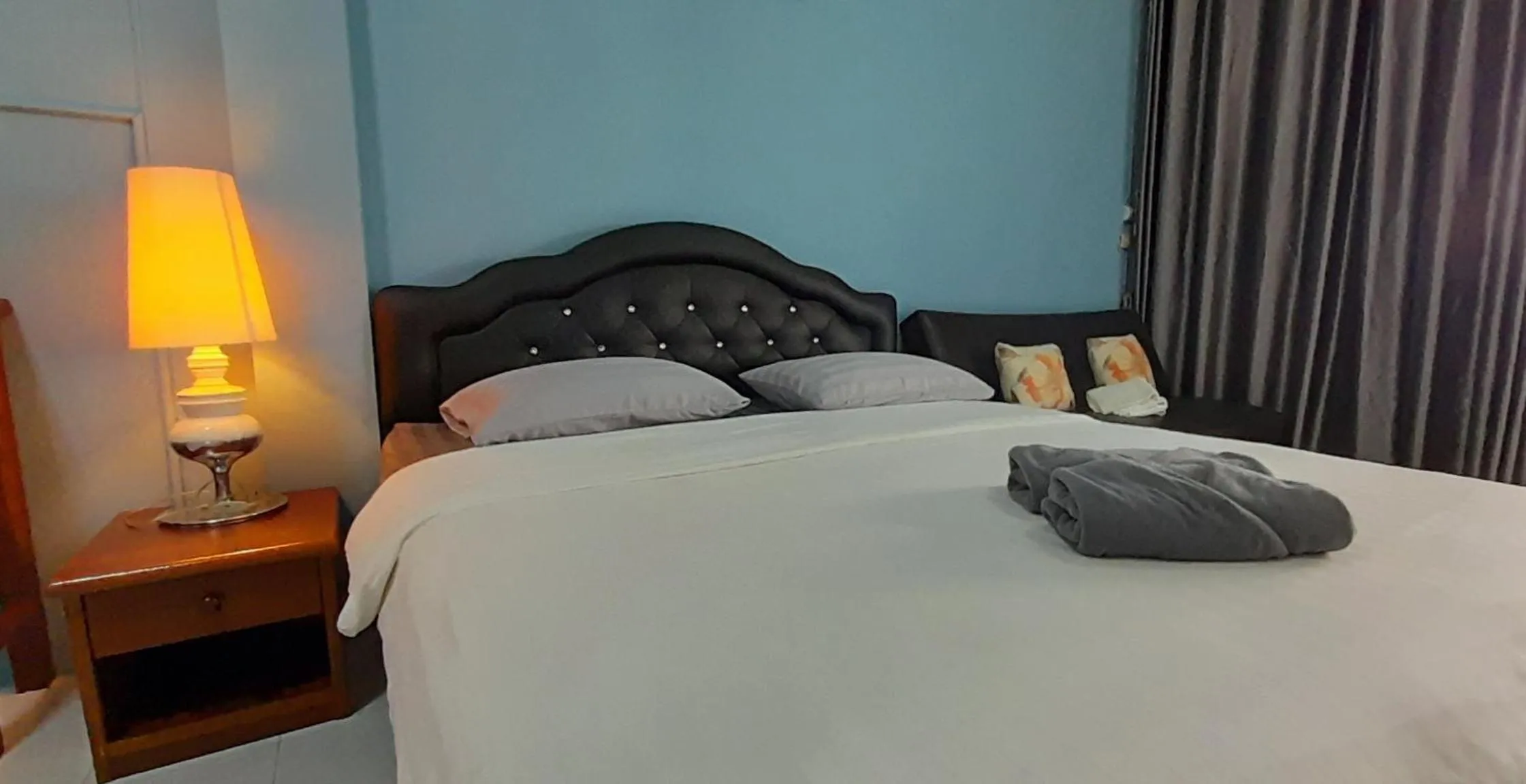 Bed in Sala Bua Room