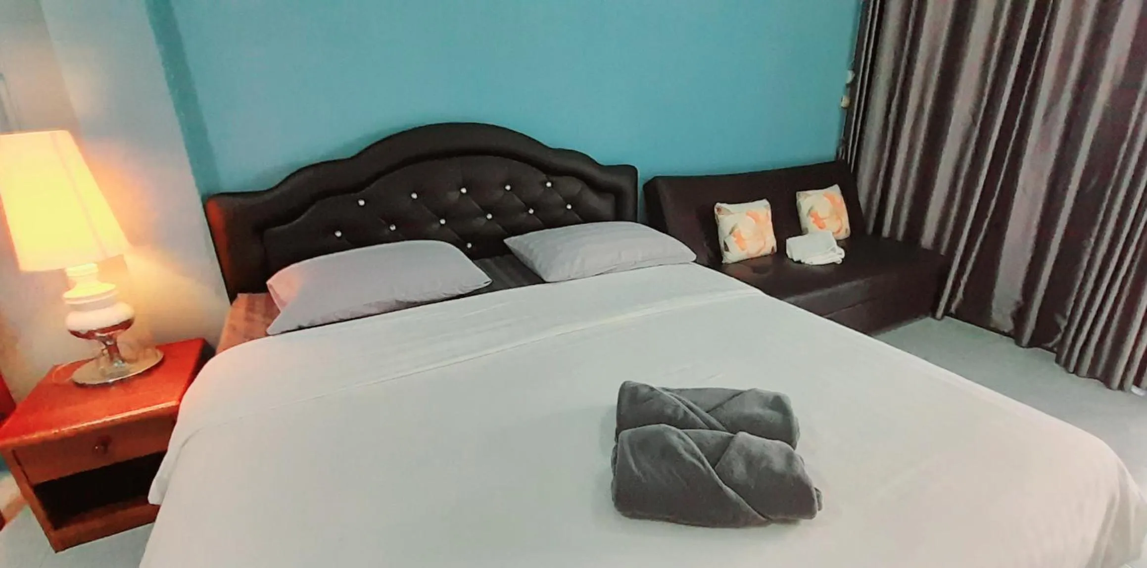 Bed in Sala Bua Room