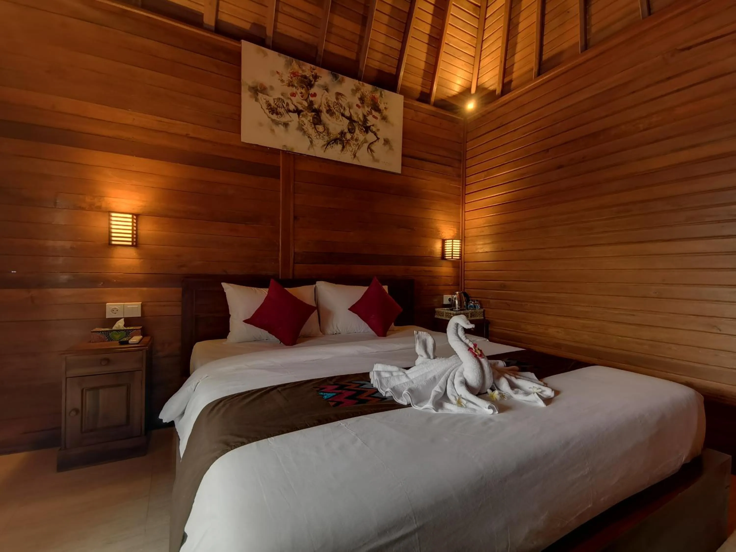 Bed in Kamasan Cottage By Reccoma