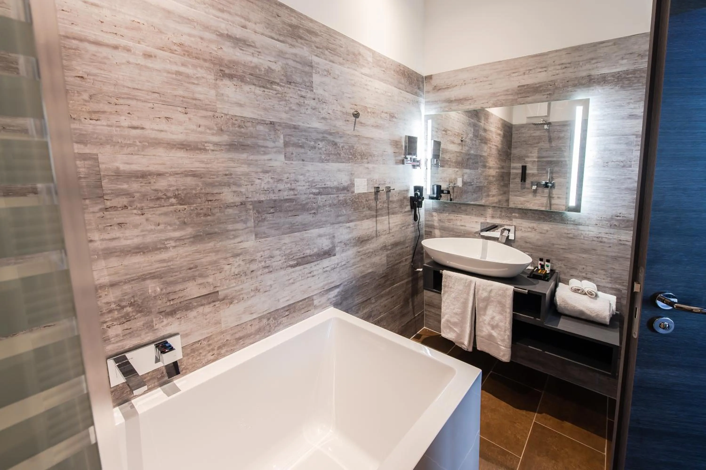 Bathroom in premium by GS Hotel