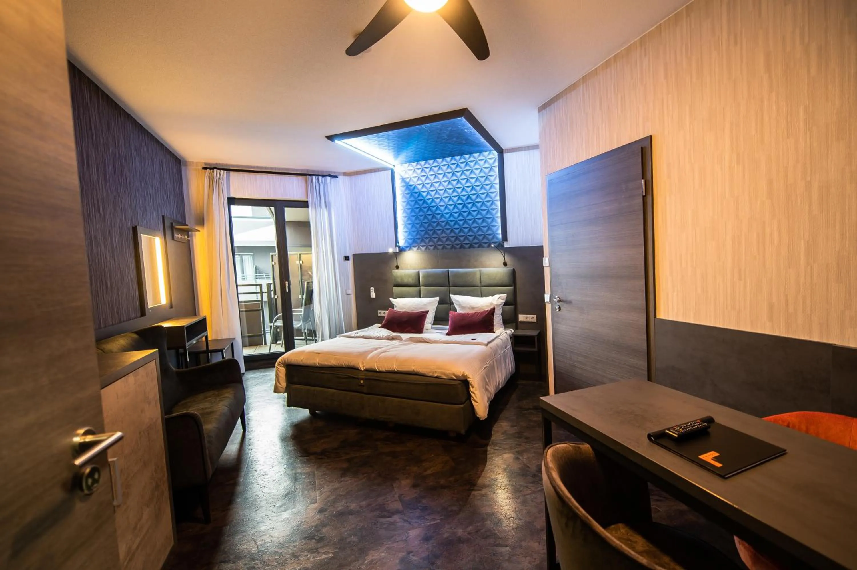 Photo of the whole room, Bed in premium by GS Hotel