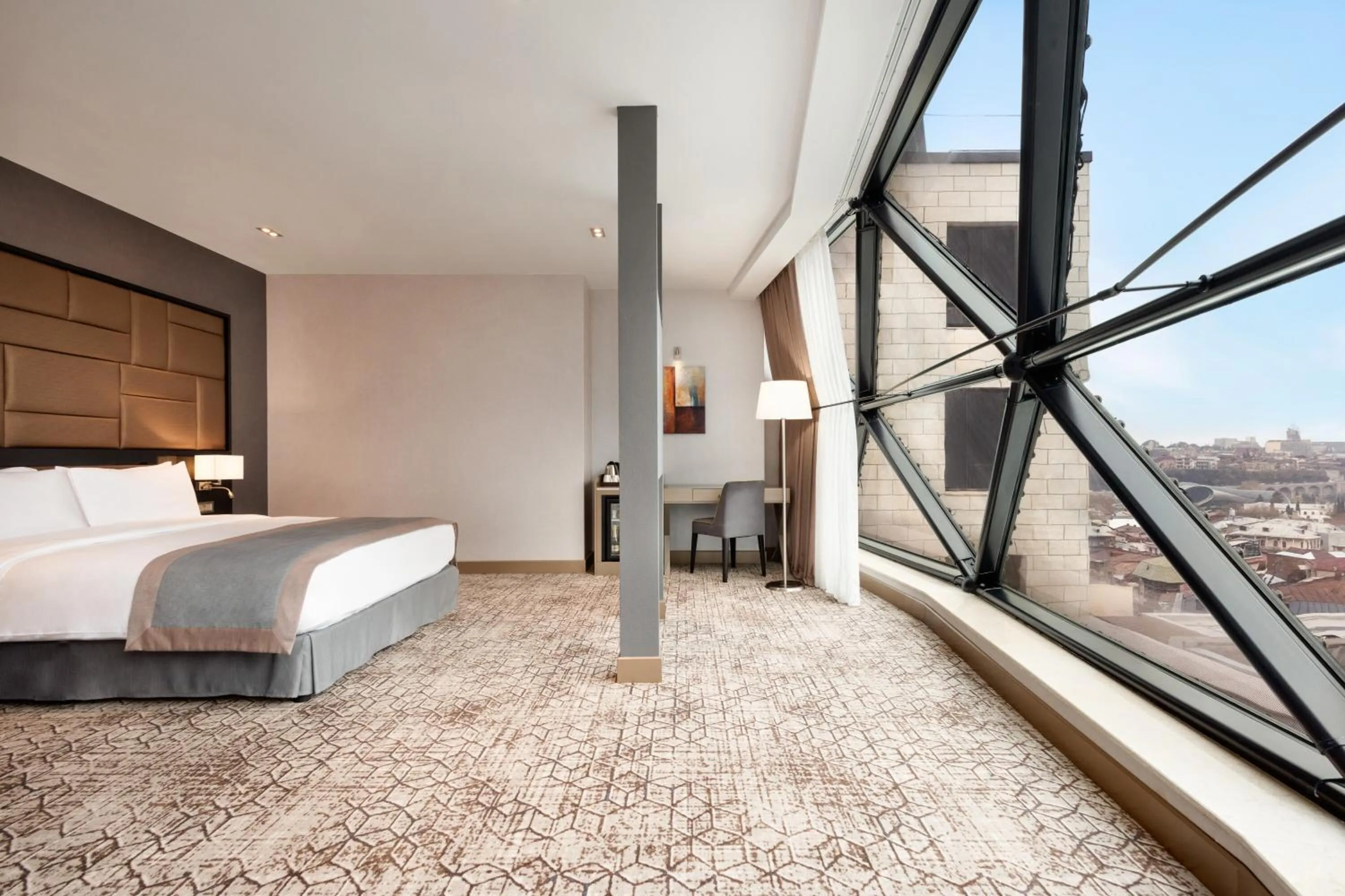 Bed in Wyndham Grand Tbilisi